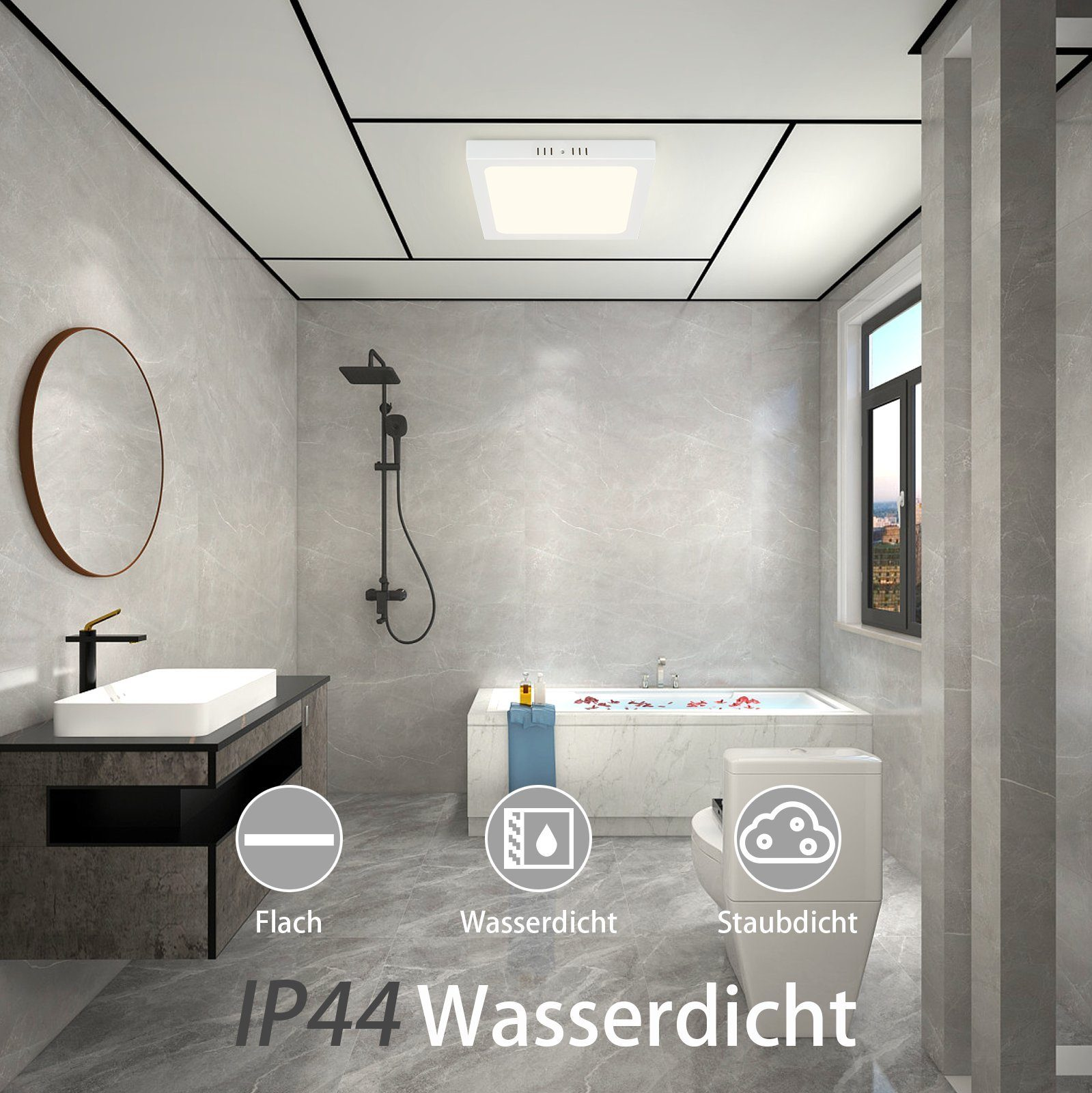 Bagno moderno con plafoniera quadrata, vasca, lavandino e toilette.