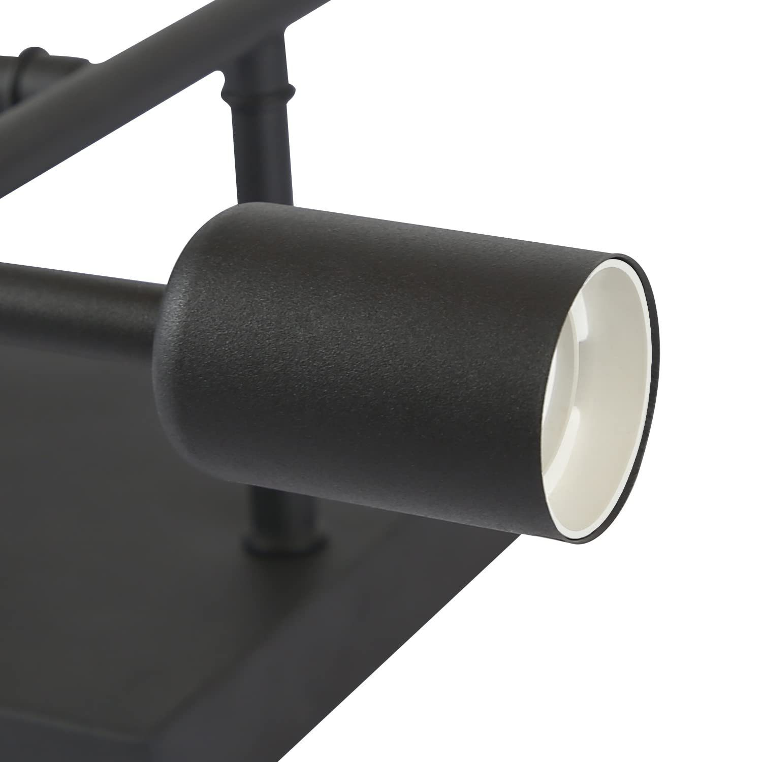 Primer plano de un accesorio de foco negro, con interior blanco, fijado a una base de montaje negra.