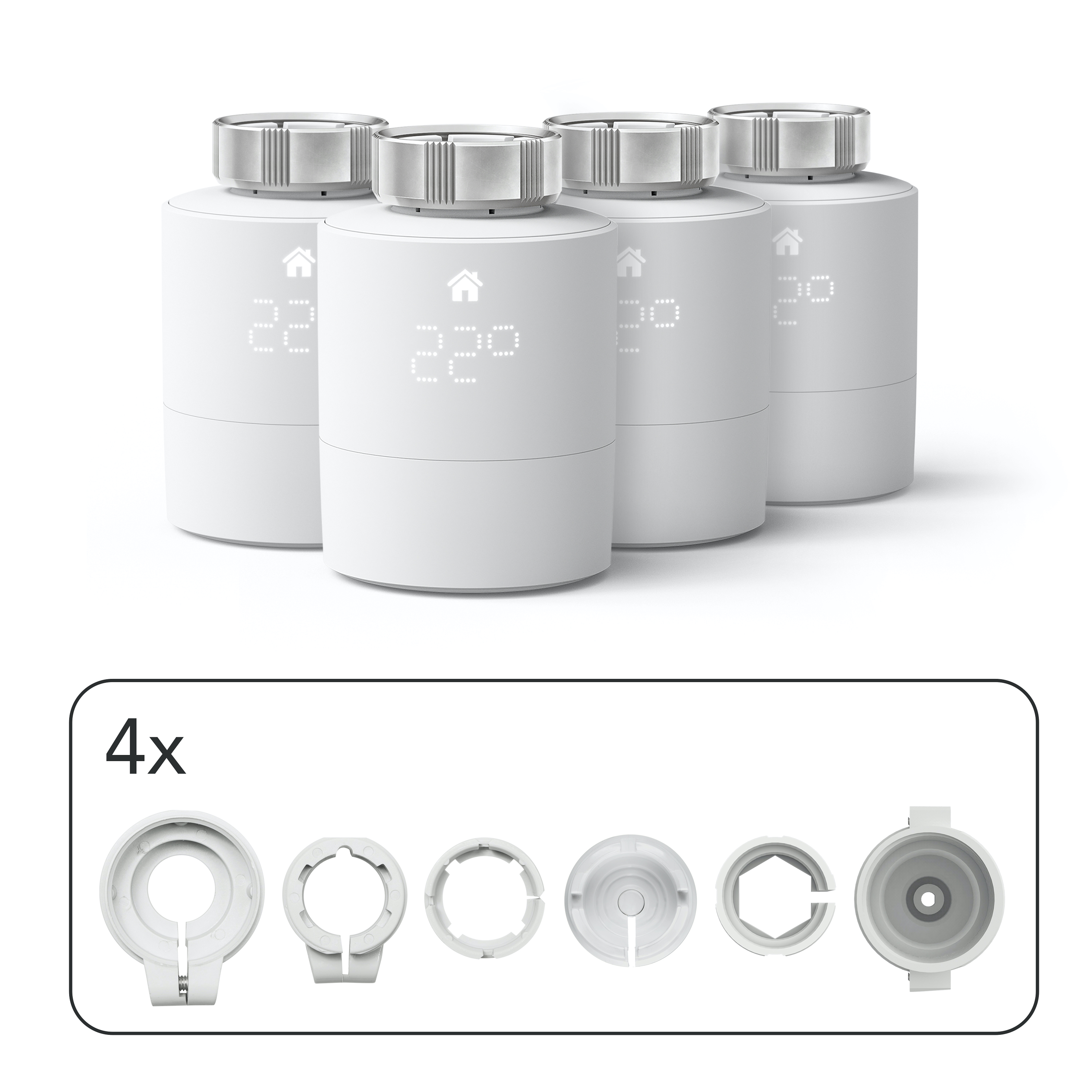White smart thermostats with accessories, on a white background.
