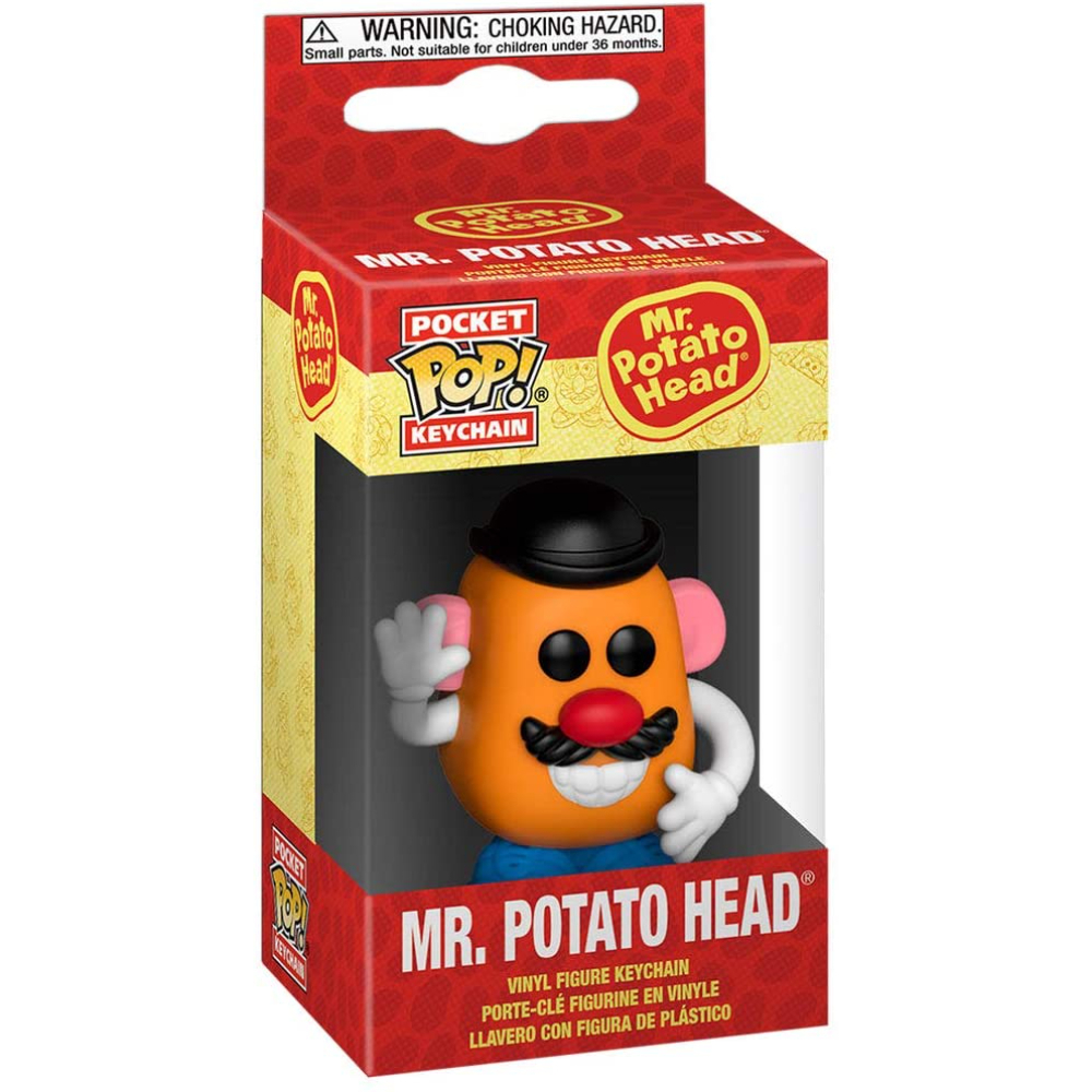 Mr. Potato Head Schlüsselanhänger in einer rot-gelben Box. Orangefarbenes Spielzeug mit schwarzem Hut, weißer Hintergrund.