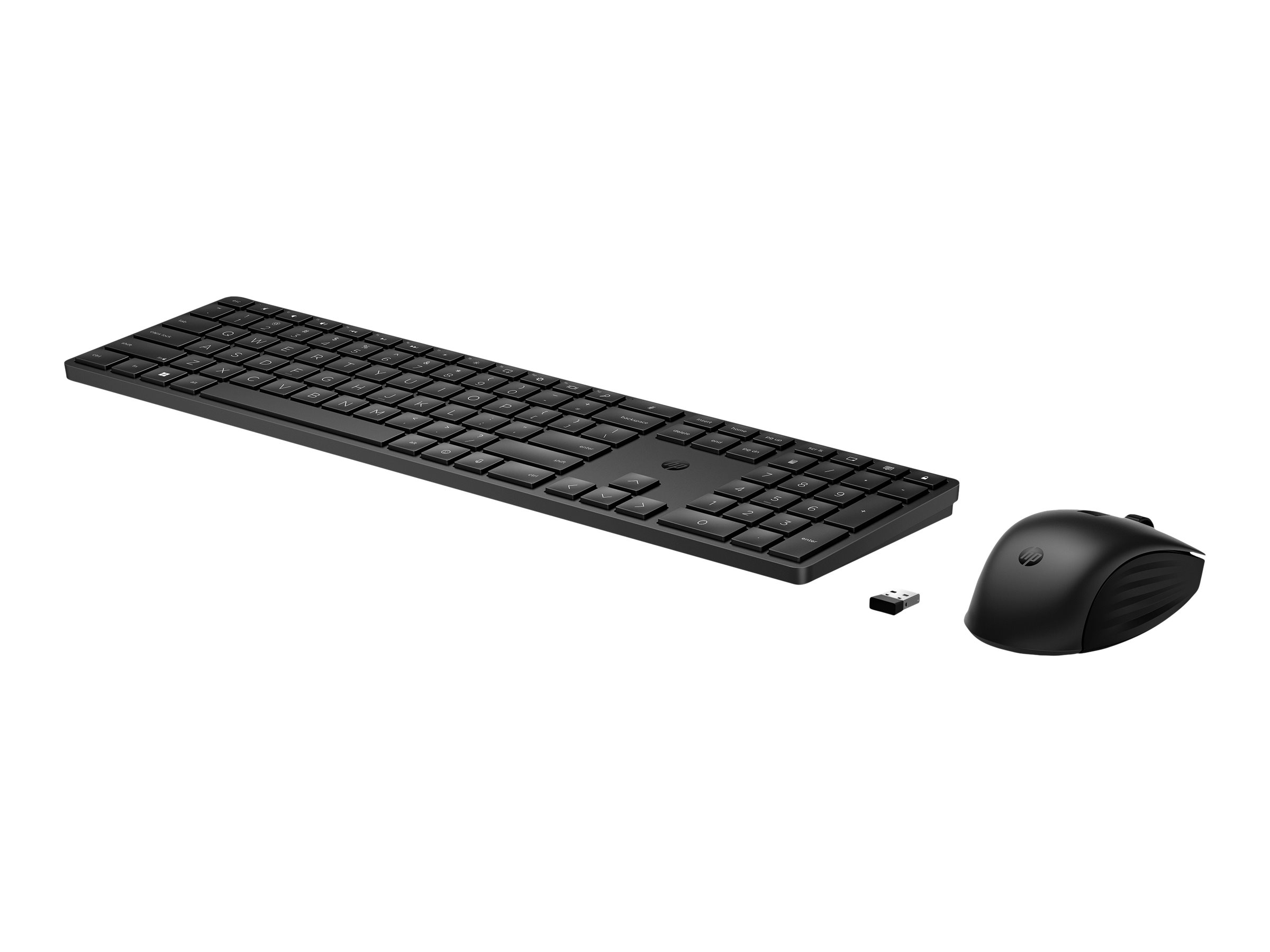 Tastiera, mouse e ricevitore USB neri su bianco. La tastiera è lunga e rettangolare.