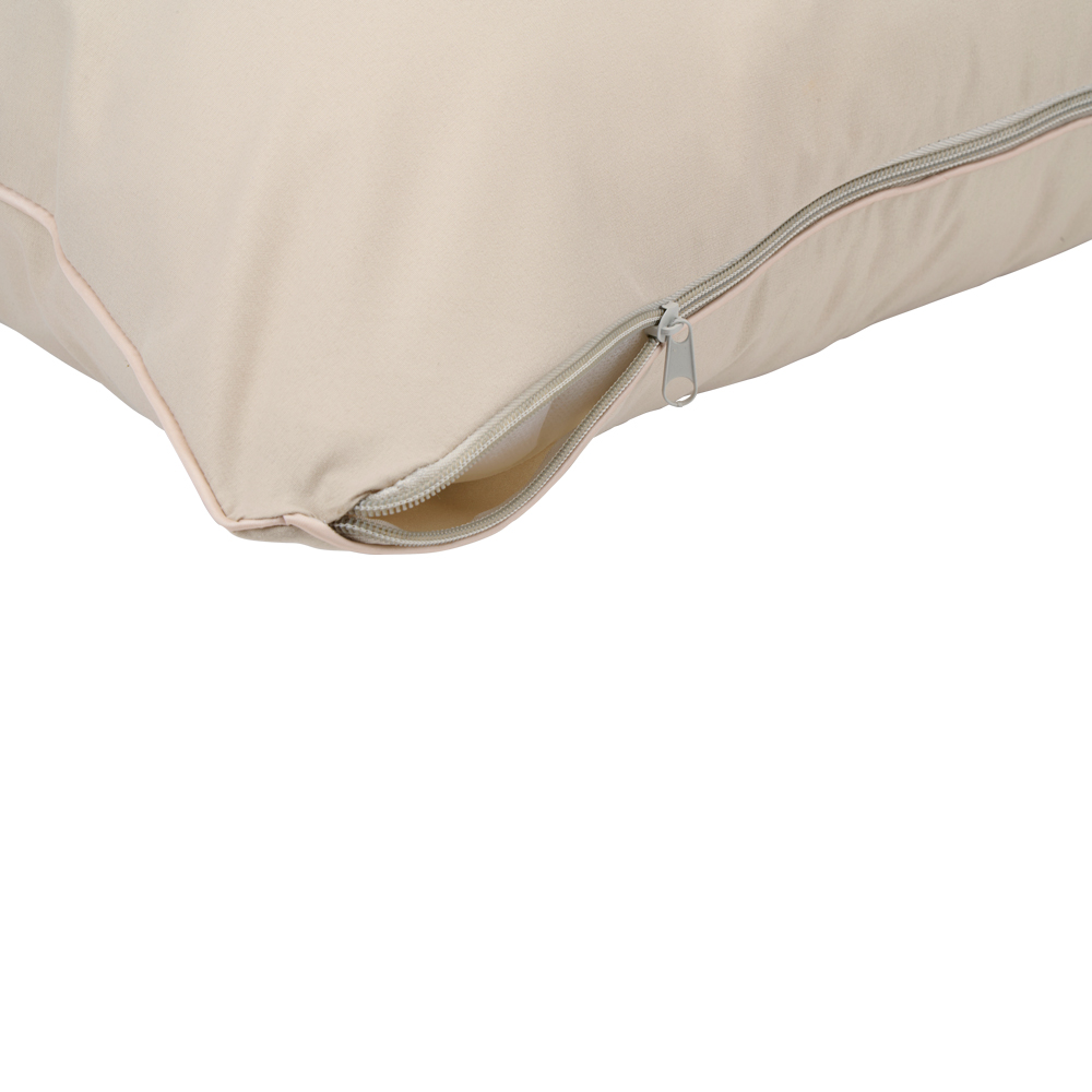 Beige pillow with a zipper partially open, close-up shot. White background.