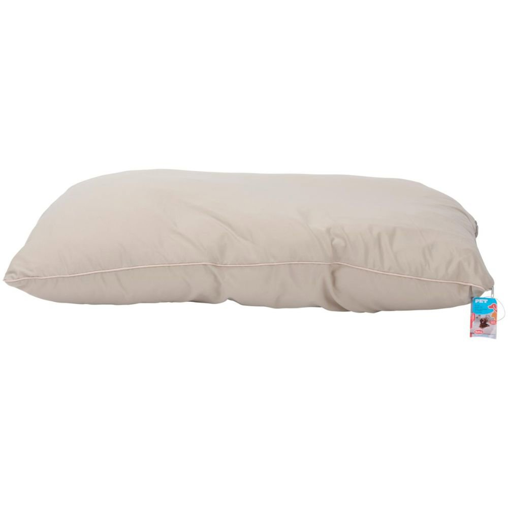 A beige dog bed, with a pink border, isolated on white.