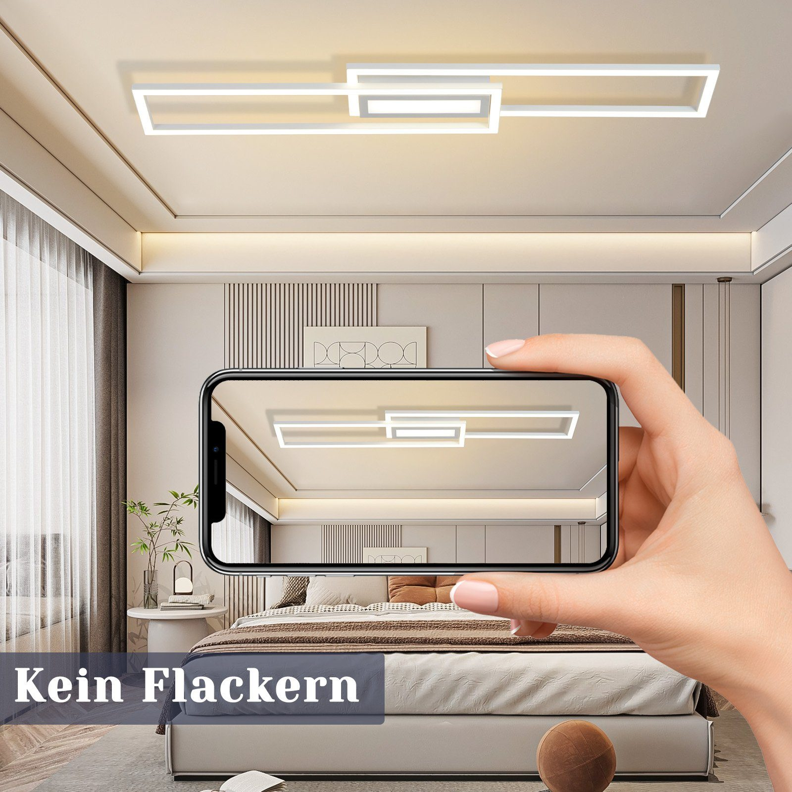 Una mano sosteniendo un teléfono que muestra una luz de techo, sobre una cama.