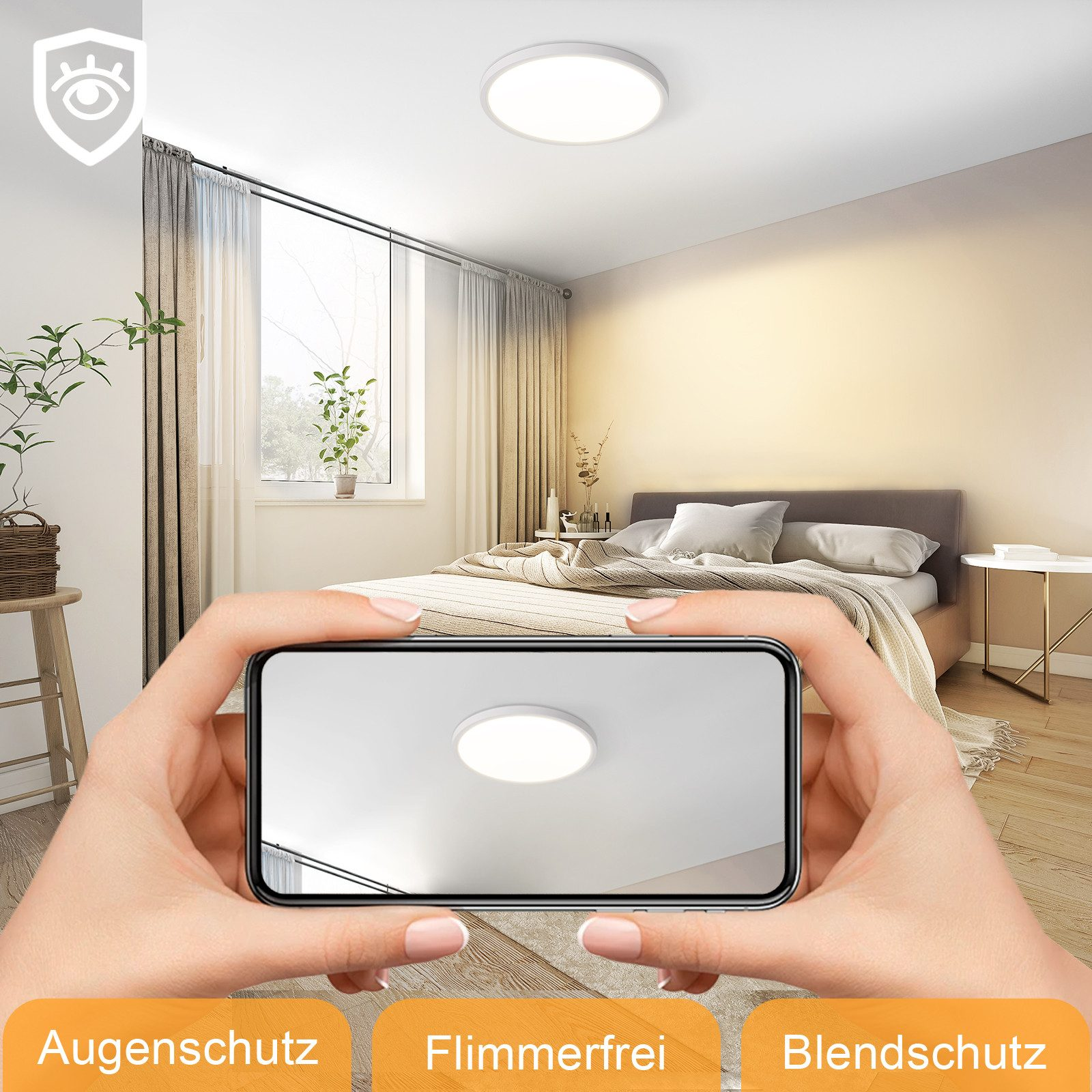 Eine Person, die ein Telefon mit einer runden Deckenleuchte hält. Im Hintergrund ein Schlafzimmer.