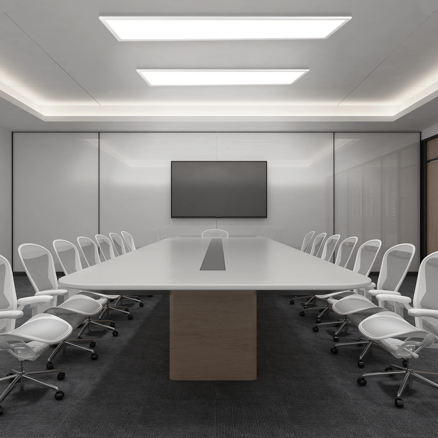 Una sala conferenze con un grande tavolo bianco, sedie e un grande schermo.