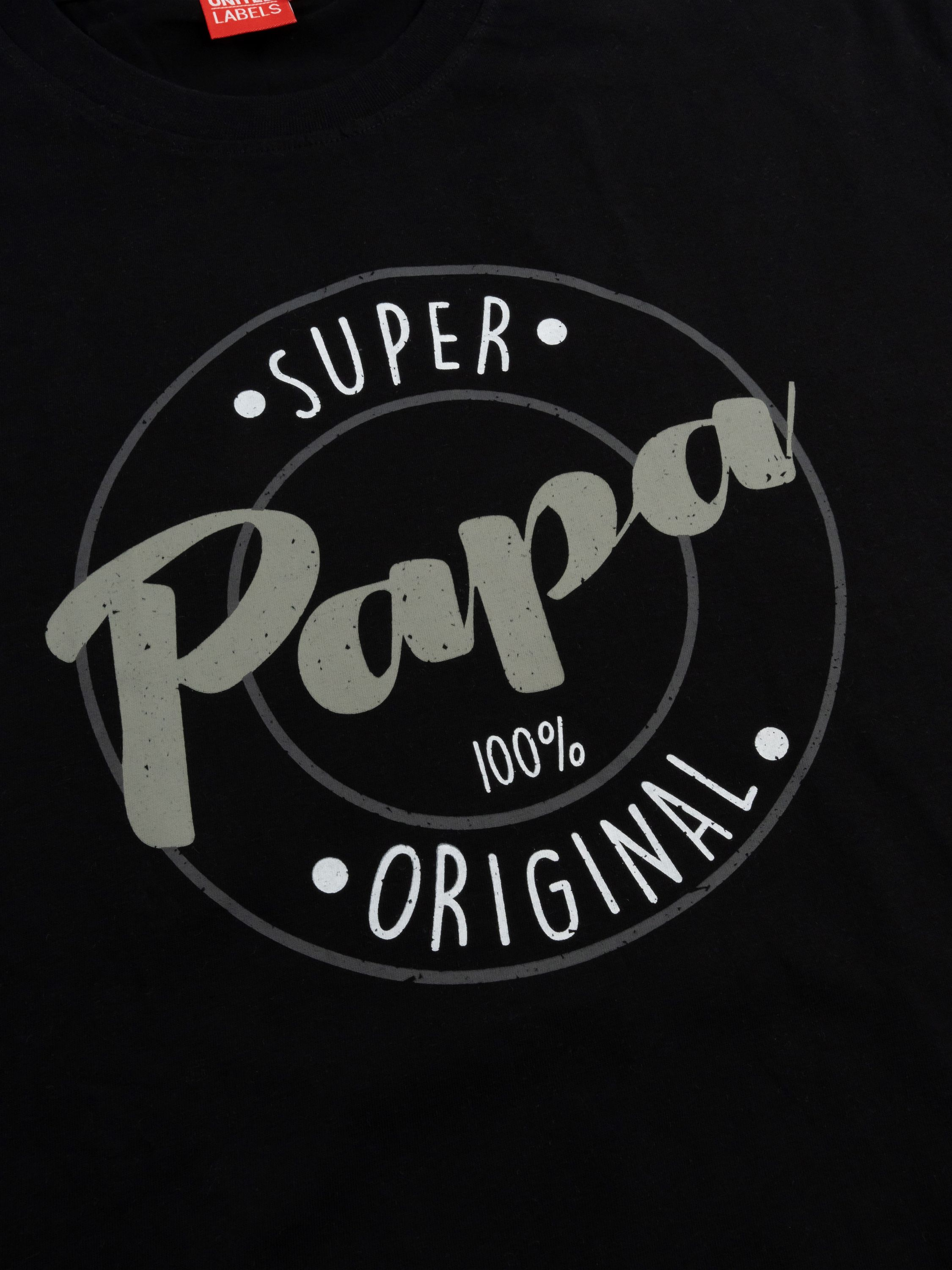 Schwarzes T-Shirt mit einem grauen Kreisdesign mit der Aufschrift „SUPER Papa 100% ORIGINAL“.