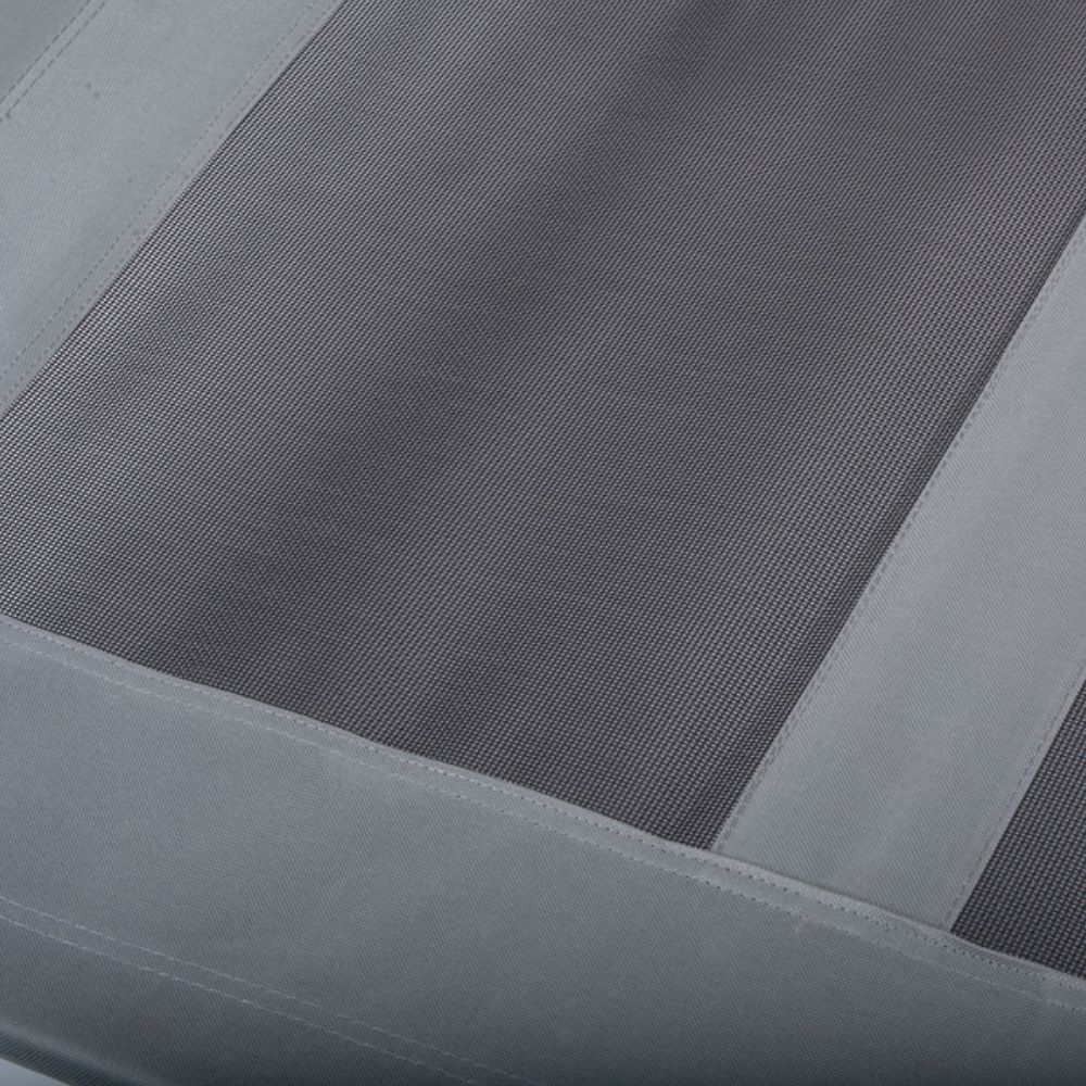 Close-up of a gray mesh and fabric panel.