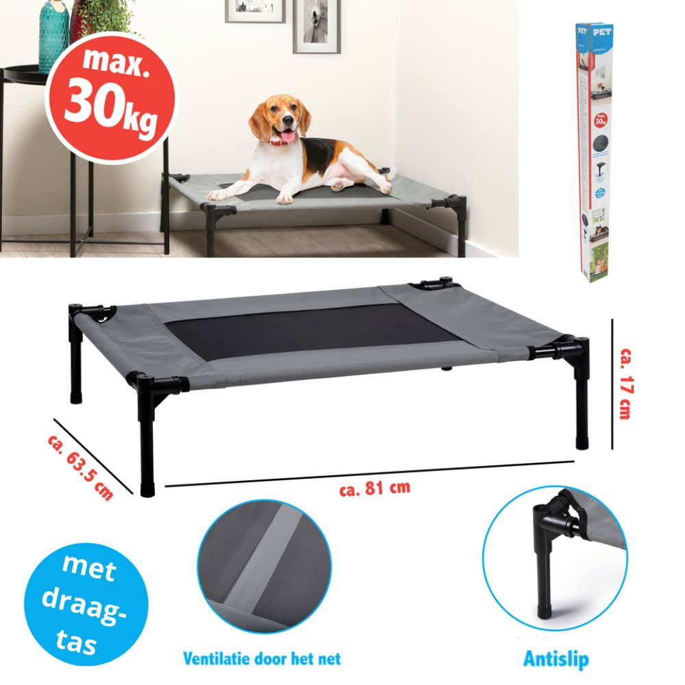 Dog bed with a beagle laying on it, and a product box.