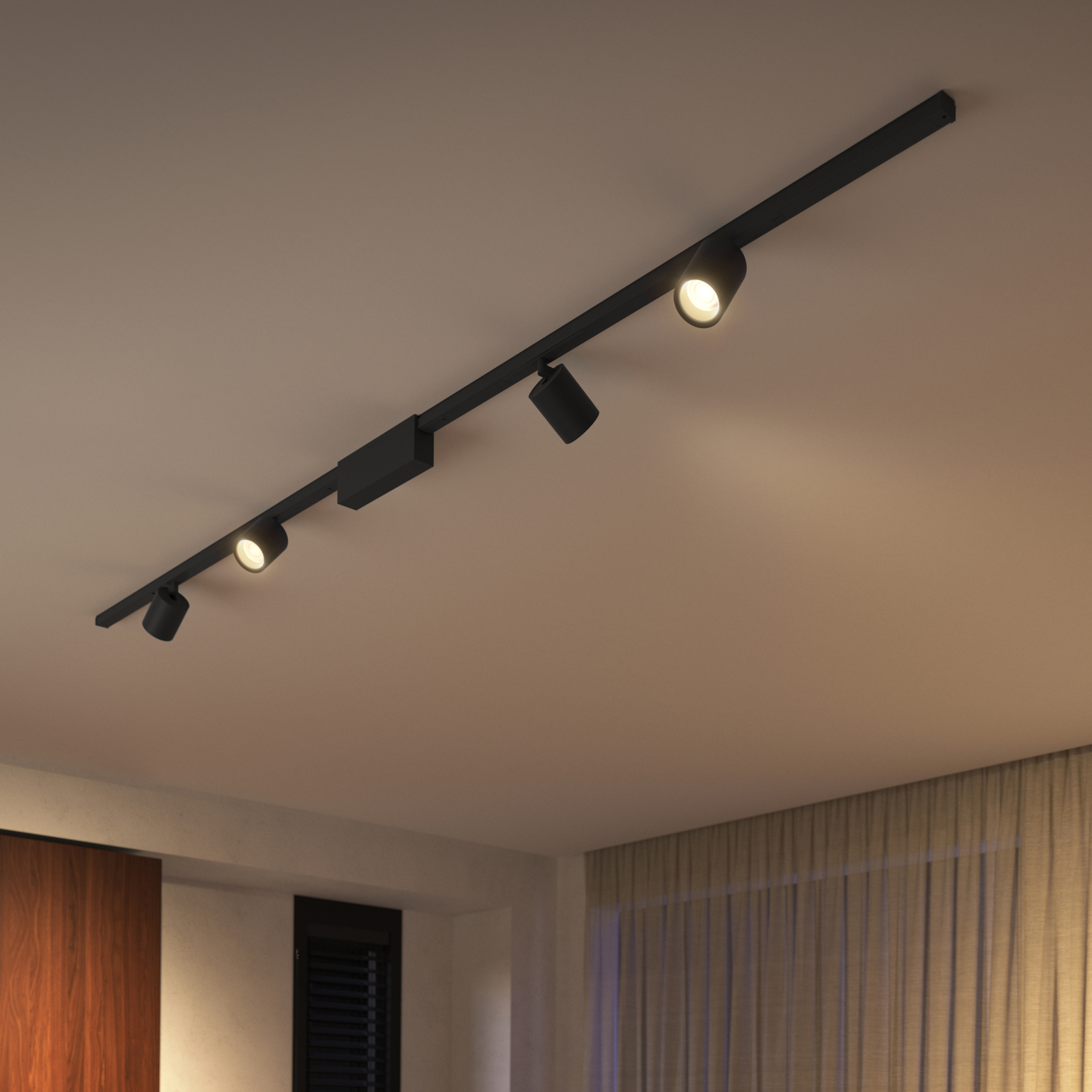 Oświetlenie szynowe zamontowane na suficie. Istnieją trzy światła skierowane w różnych kierunkach.