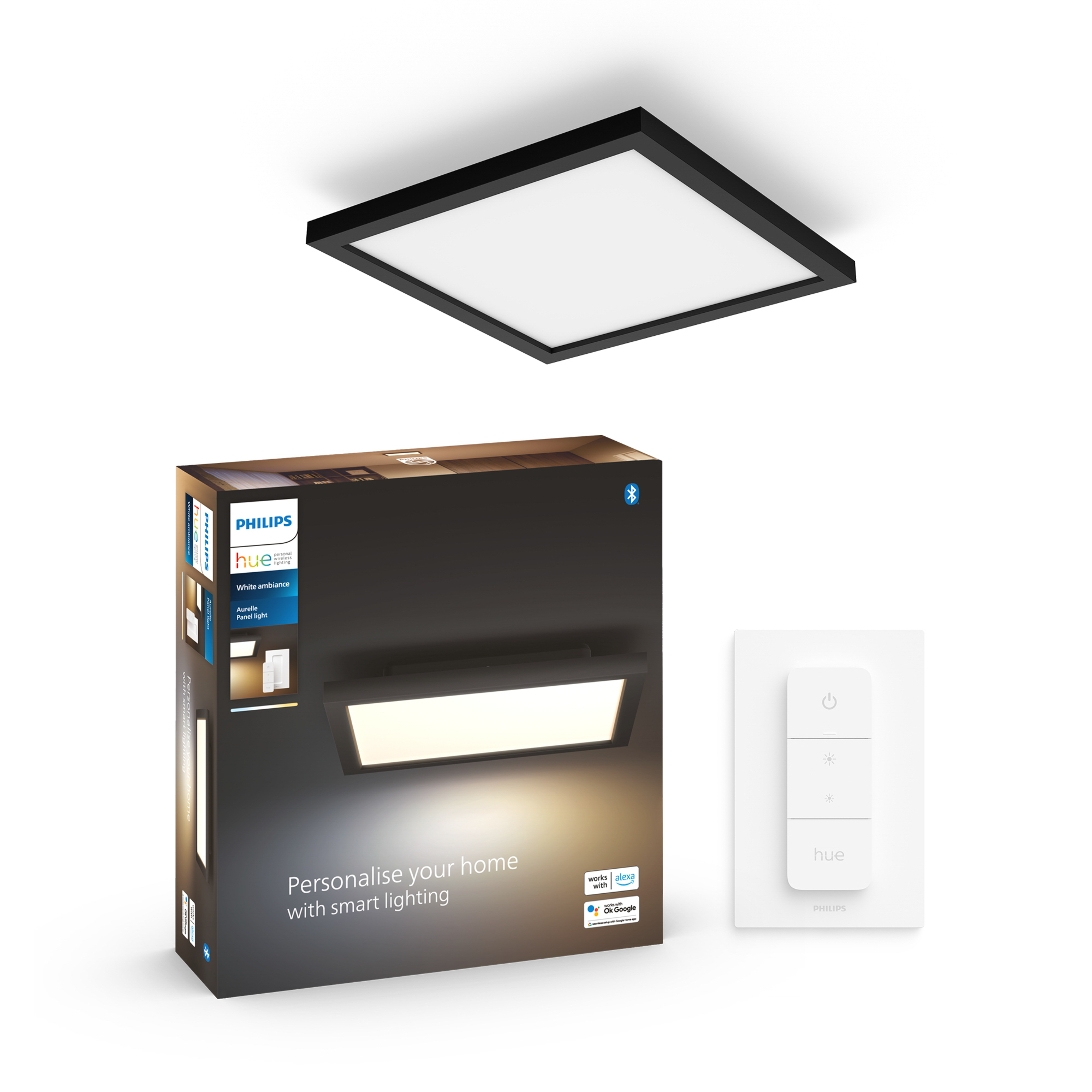 Una plafoniera quadrata nera, una scatola e un telecomando su bianco. La scatola dice 'Philips hue'.