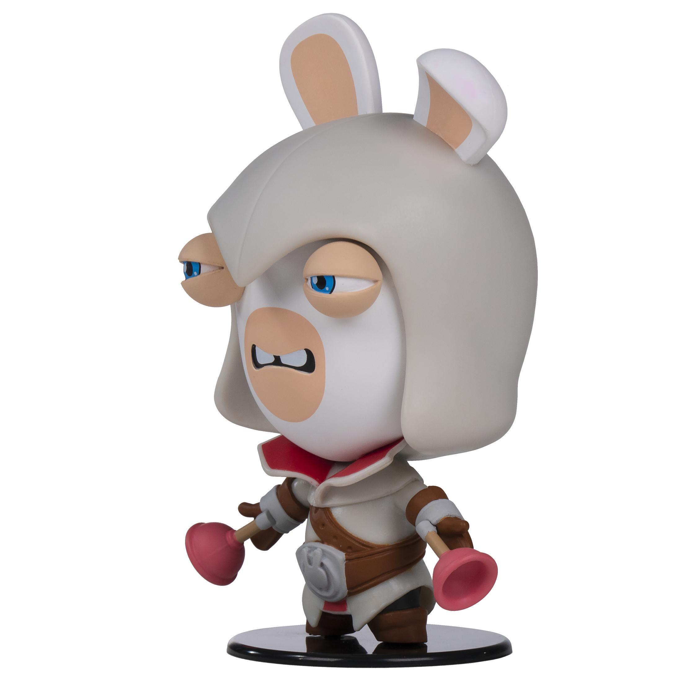 Eine weiße Hasenfigur aus dem Rabbids-Spiel, die zwei Pömpel hält. Weißer Hintergrund.