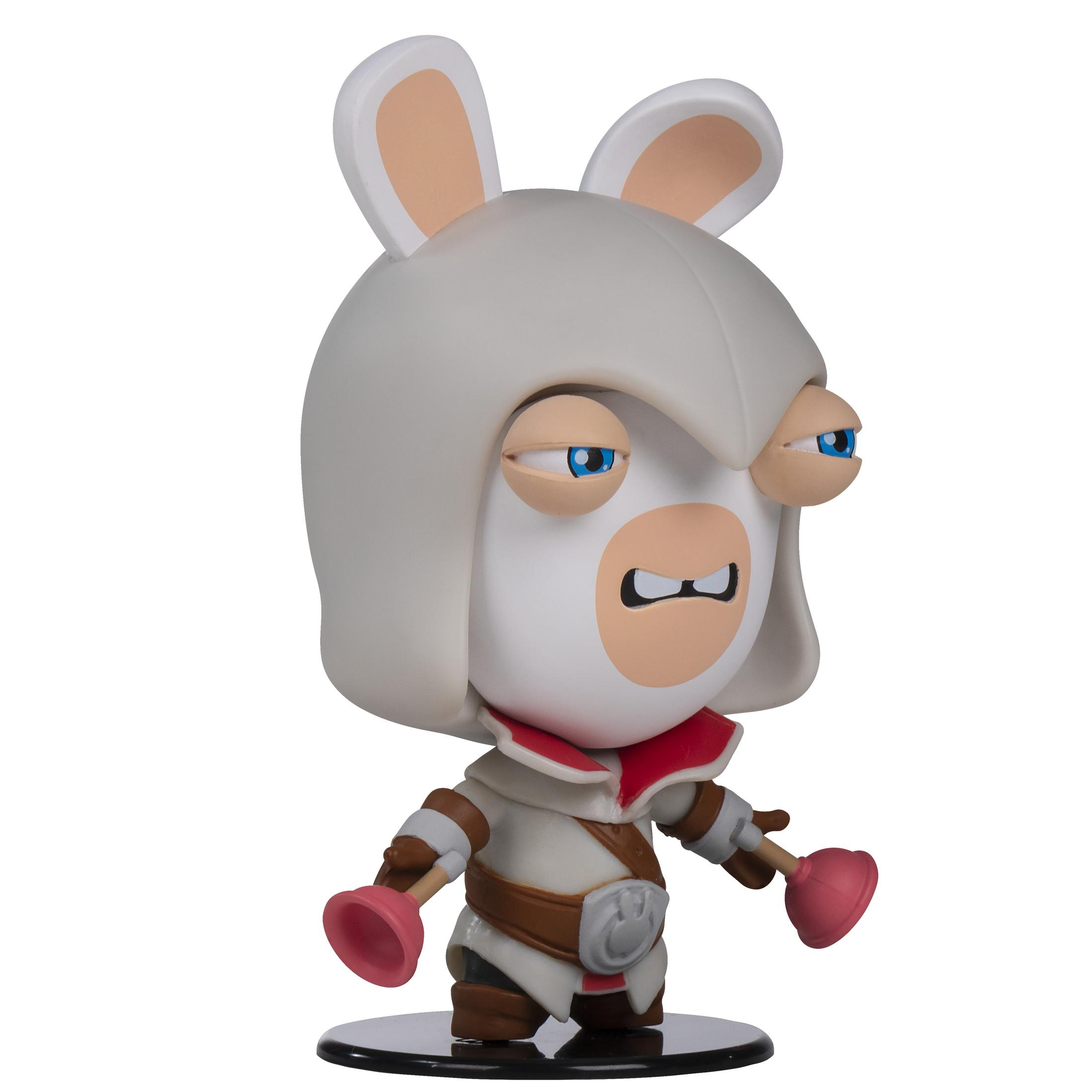 Eine weiße Rabbid-Figur im Assassin's Creed-Outfit, hält zwei Pümpel.