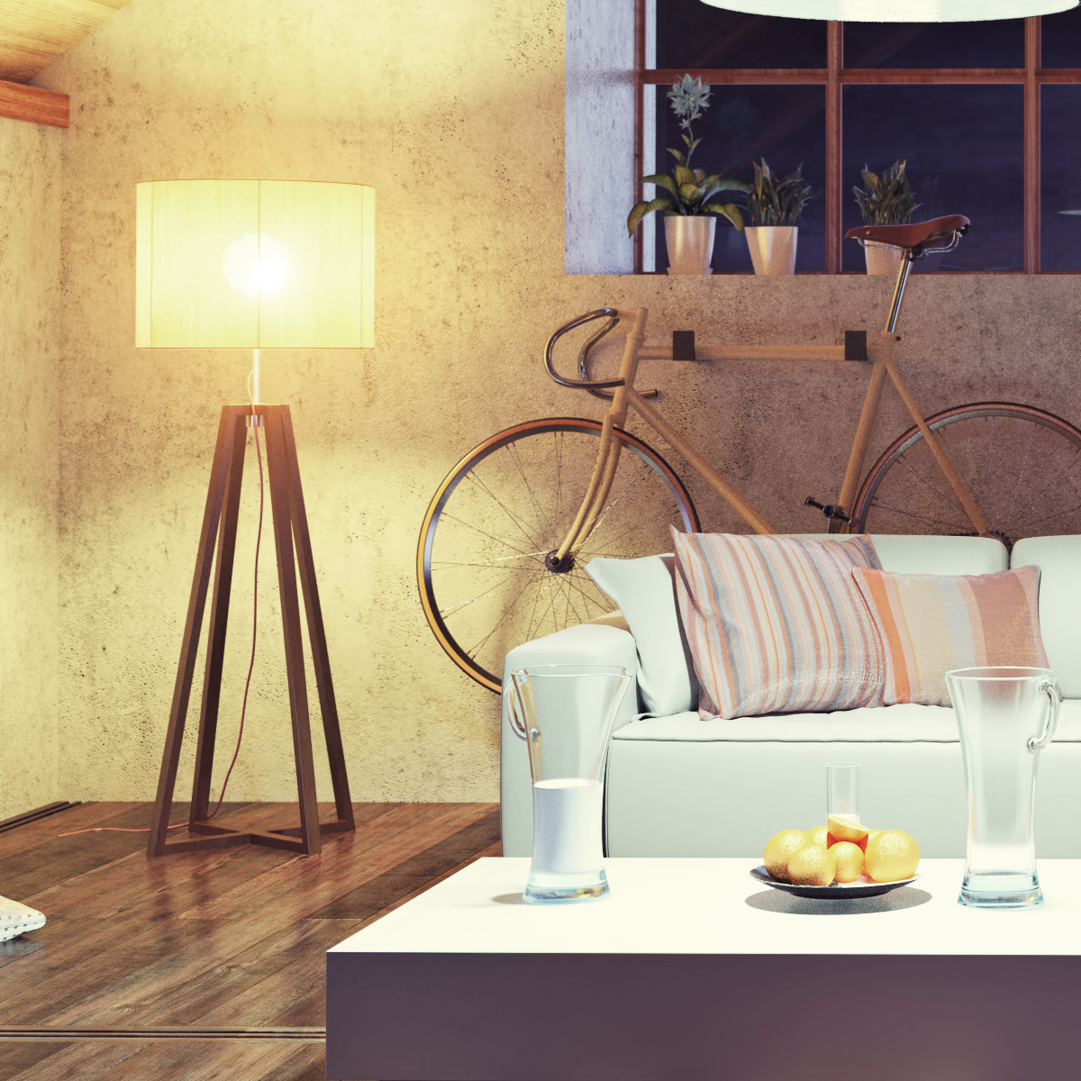 Wohnzimmer mit Stehlampe, Sofa, Fahrrad und Tisch mit Zitronen und Gläsern.