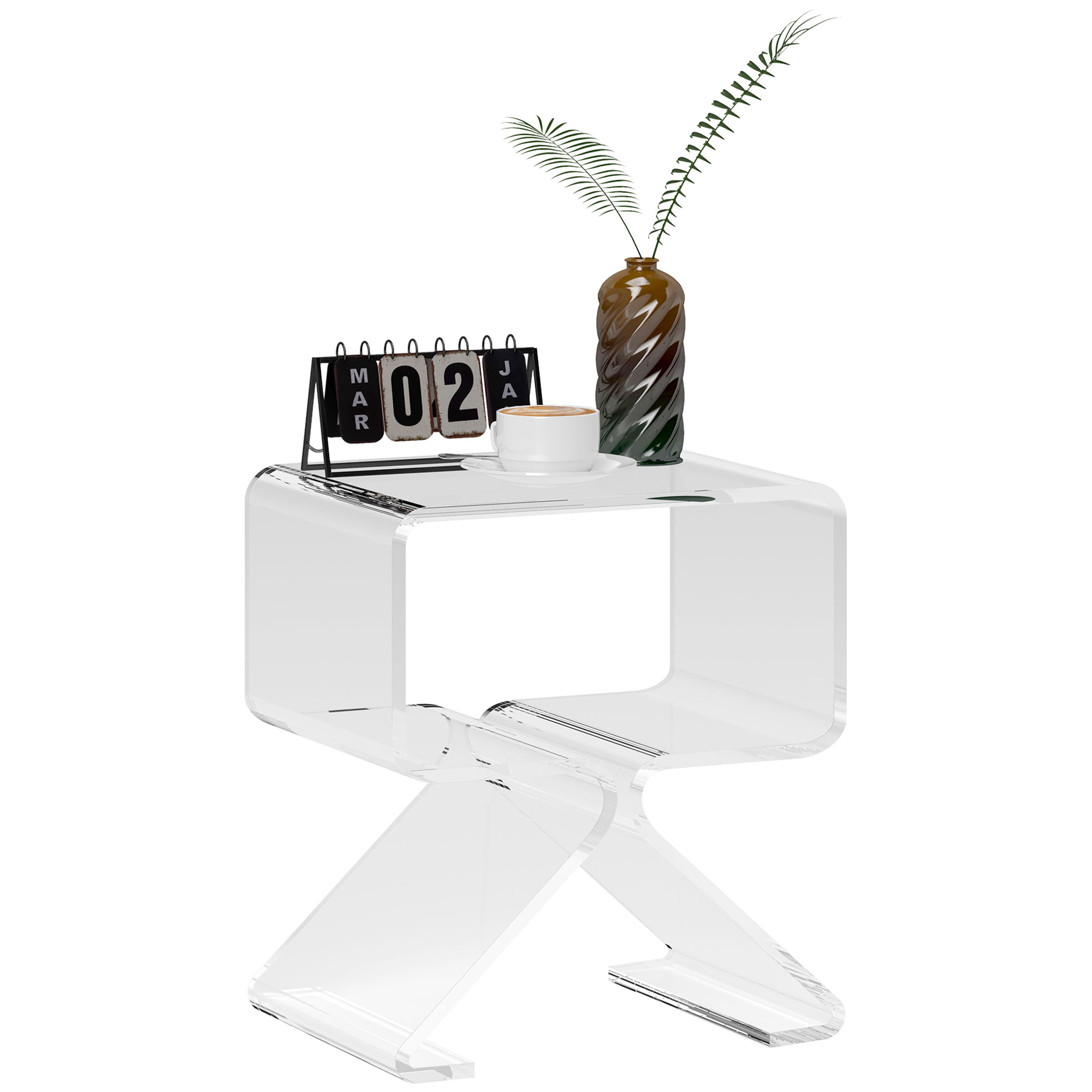 Tavolino laterale in acrilico trasparente con elementi decorativi: calendario, vaso e tazza.