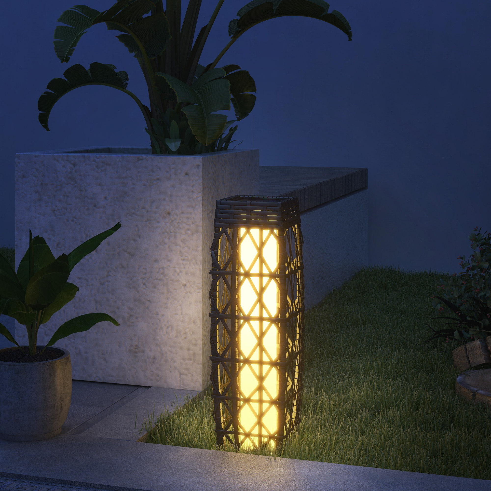 Lampada da giardino illuminata per esterni, circondata da piante e un blocco di pietra.