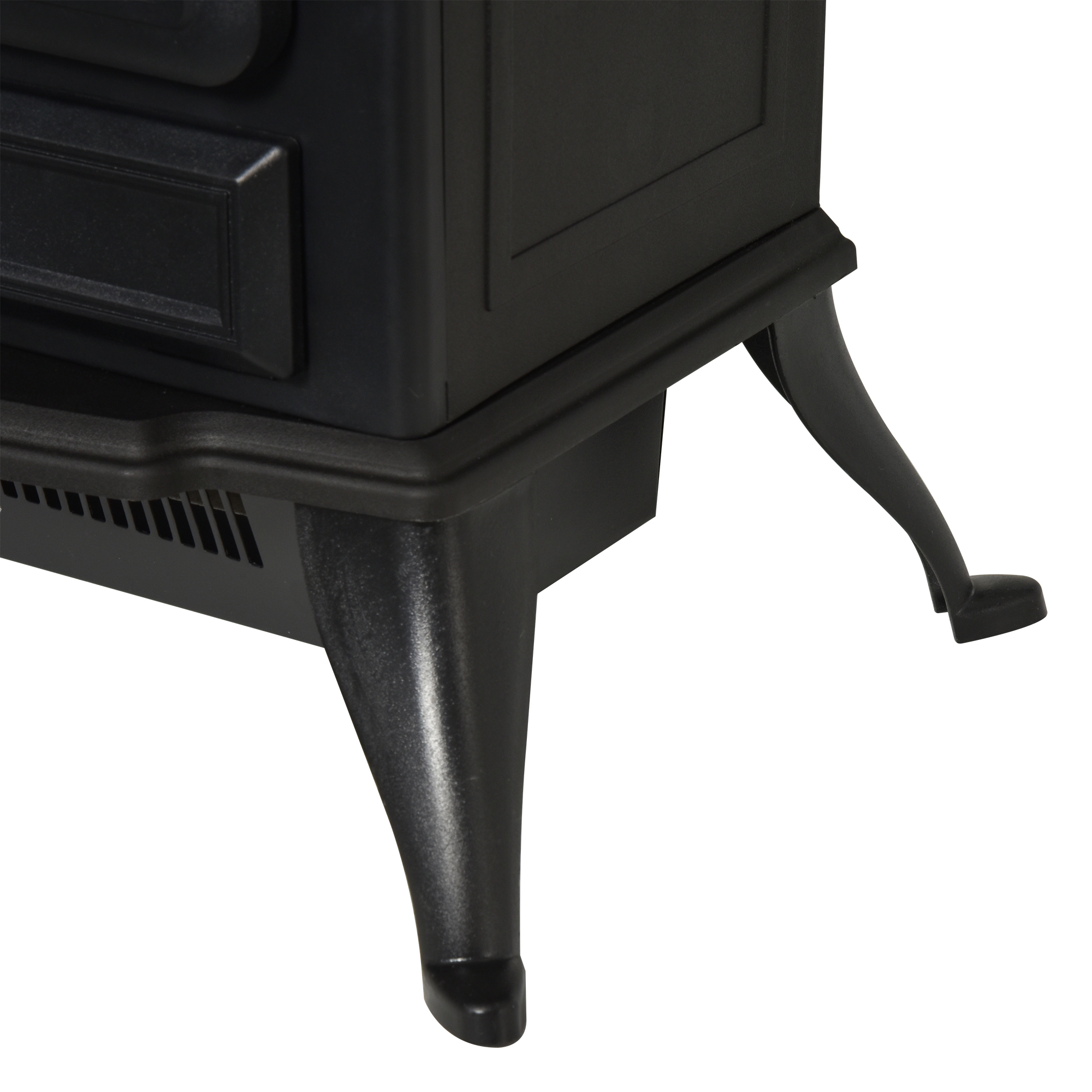 Primo piano di una base per camino nera con gambe decorative. La base ha delle fessure.