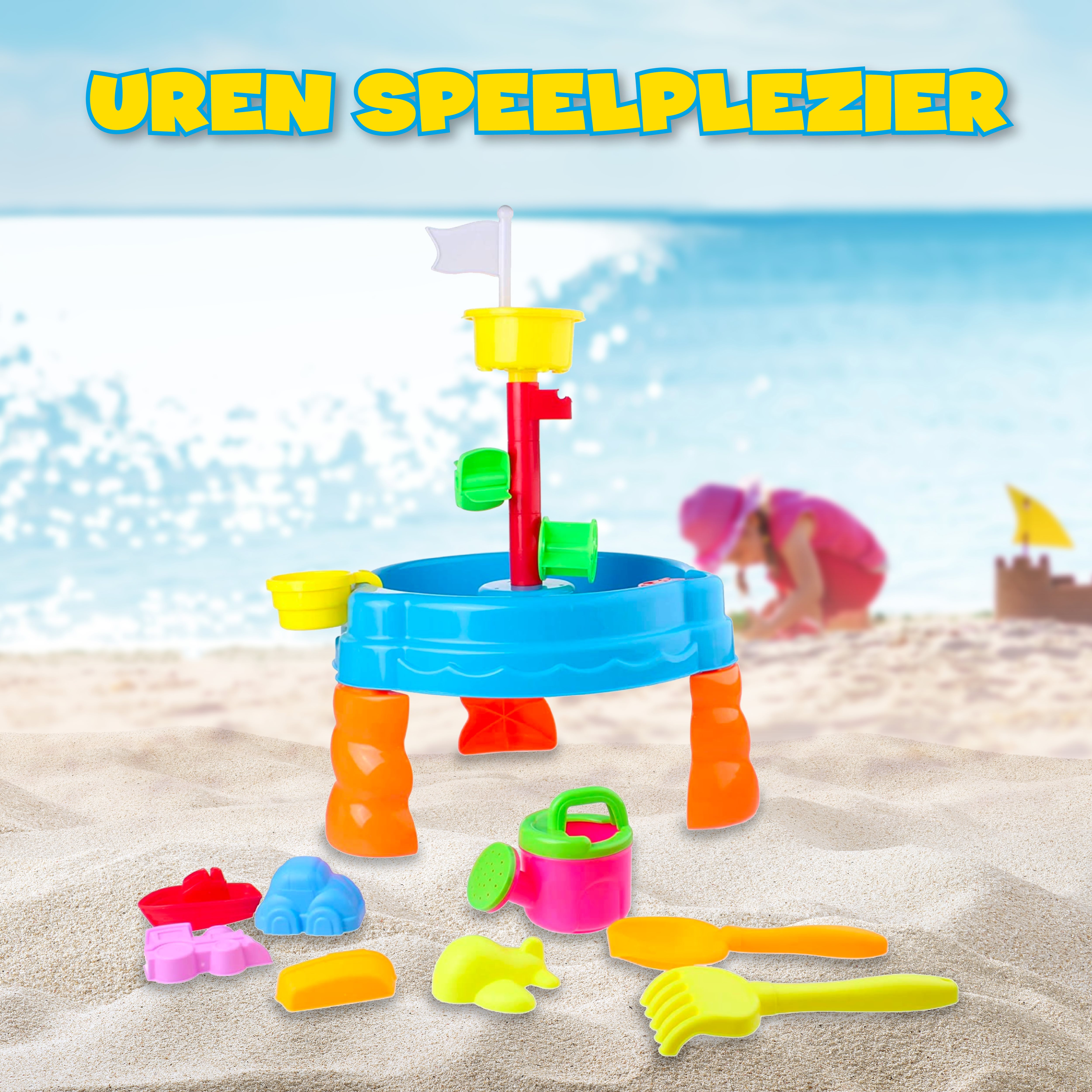 A colorful beach toy set: sand table, watering can, and molds on a sandy beach.