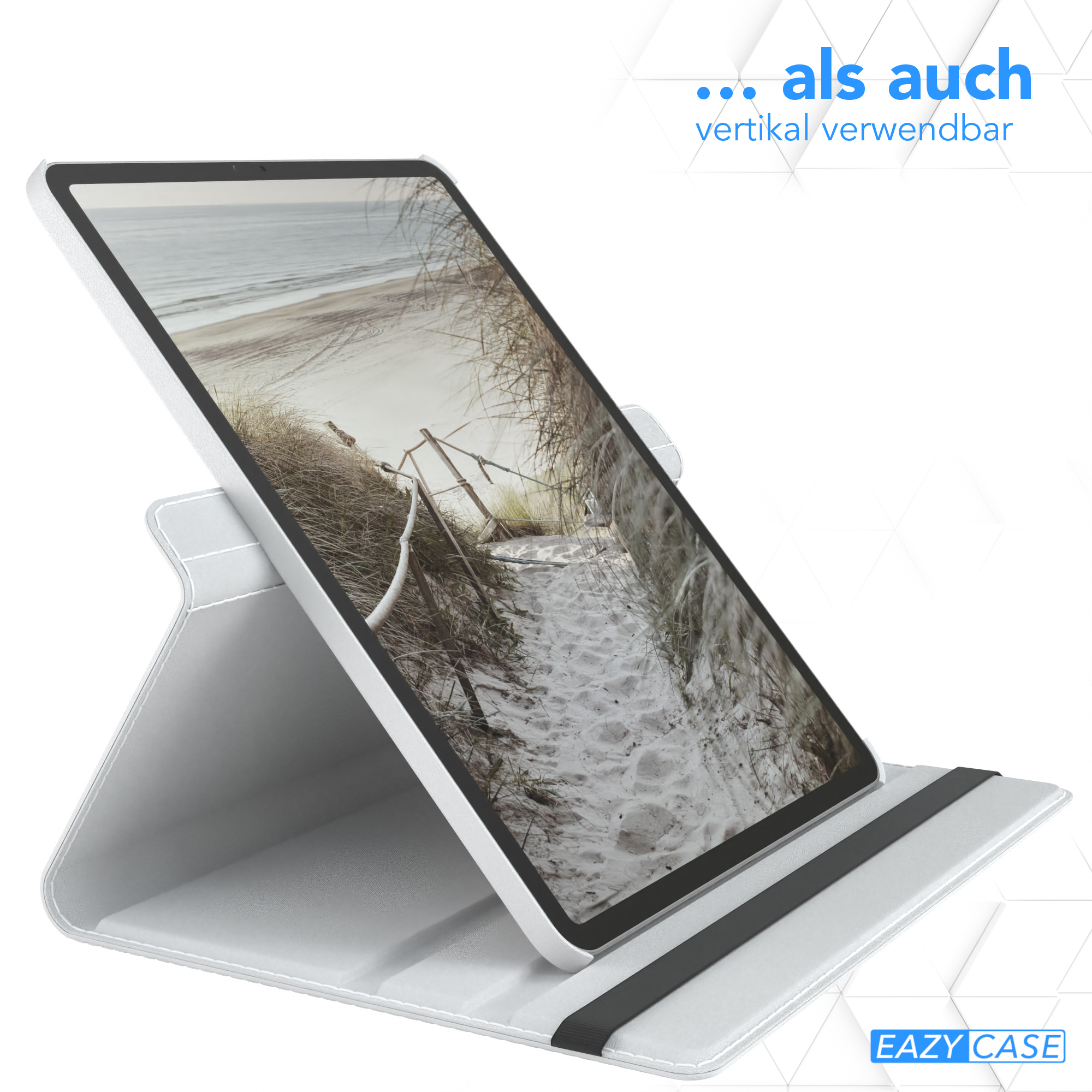Ein weißes Tablet in einem Ständer, das ein Bild mit Strand und Dünen anzeigt.