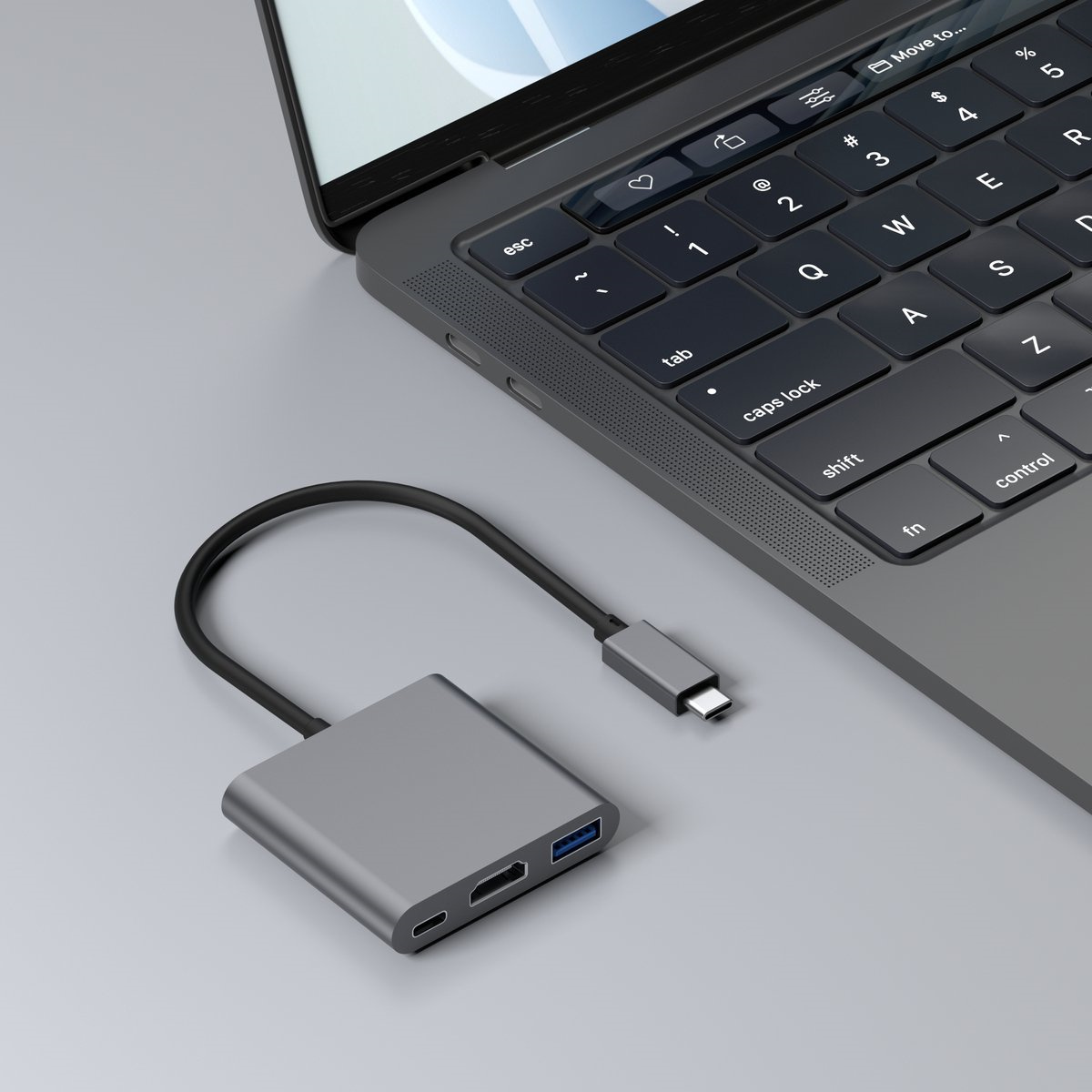 Ein grauer USB-C-Hub, der mit einem Laptop verbunden ist, mit mehreren Anschlüssen.