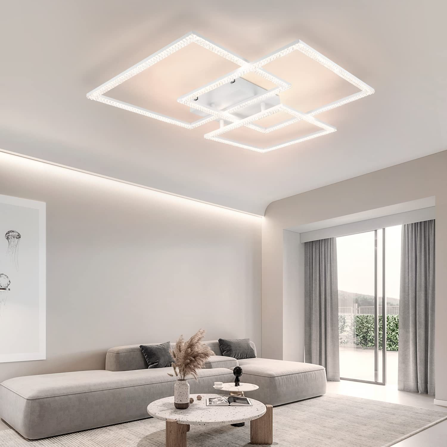 Salón moderno con luces de techo, sofá y mesa de centro.