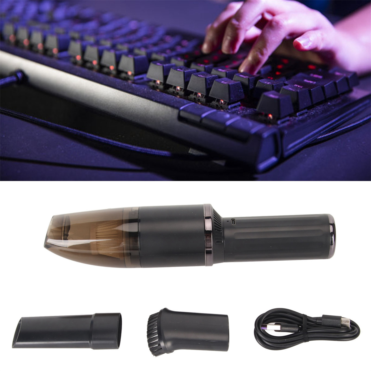 Die Hand einer Person auf einer Tastatur, ein Staubsauger und Aufsätze. Der Staubsauger ist schwarz.