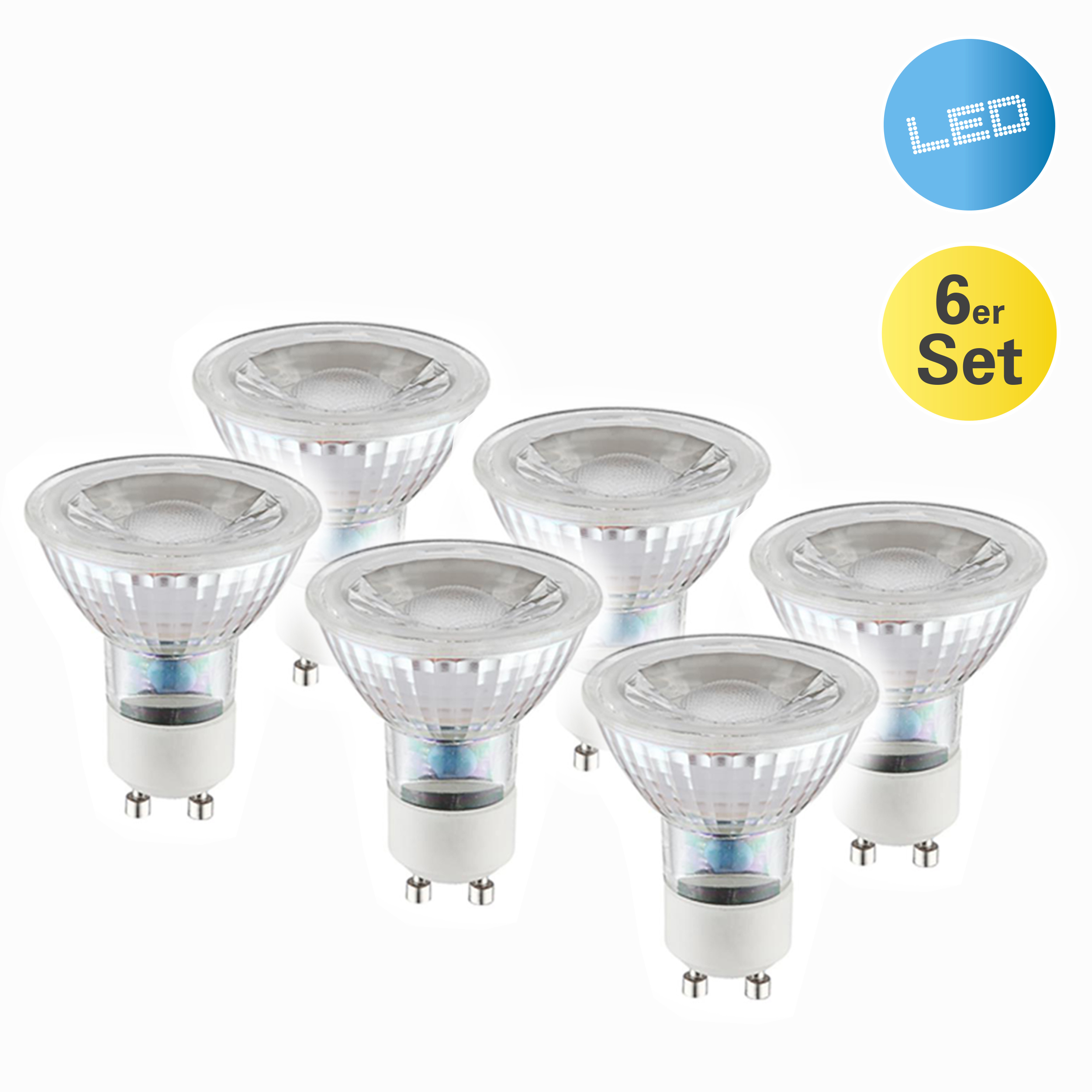 Sechs LED-Strahler in einer Gruppe angeordnet. Sie haben eine klare, geriffelte Glasfront und einen weißen Sockel.