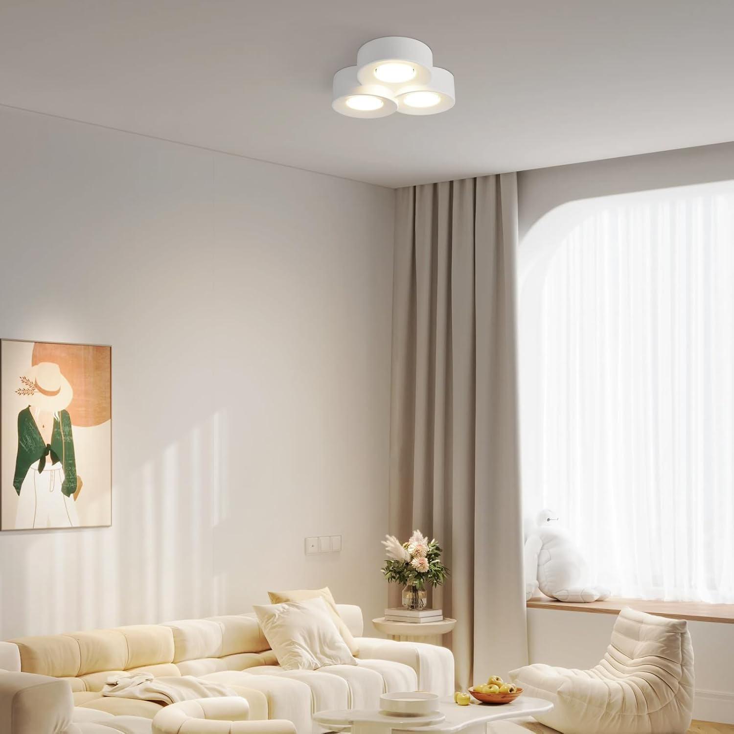 Salón con paredes blancas, sofá y luces de techo.