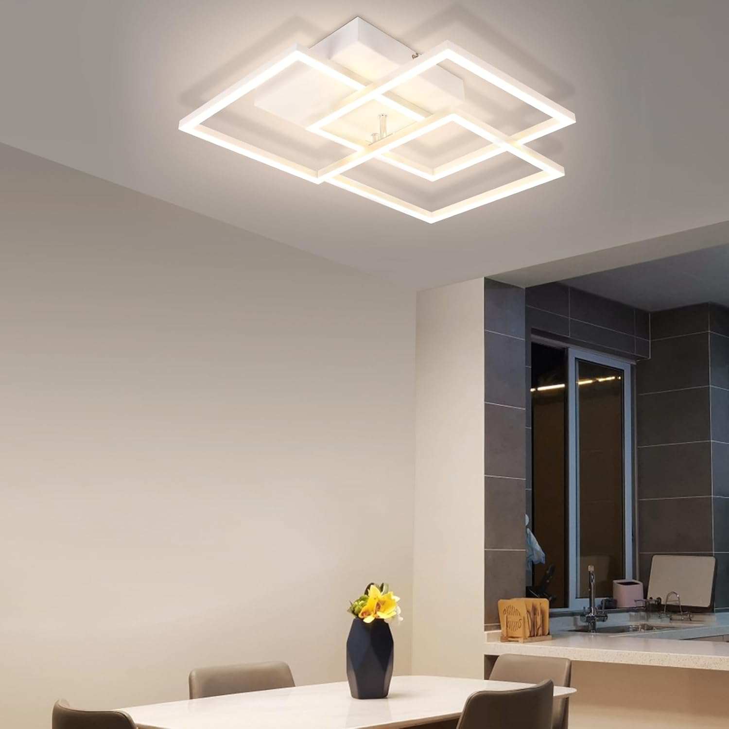 Luminaria de techo moderna con diseño geométrico blanco.