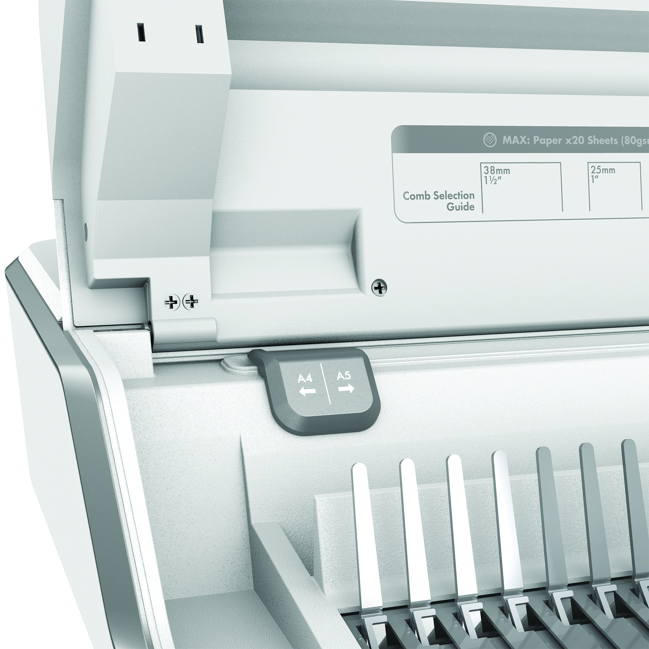 Zbliżenie białej maszyny do oprawy papieru. Maszyna posiada selektory rozmiarów A4 i A5.