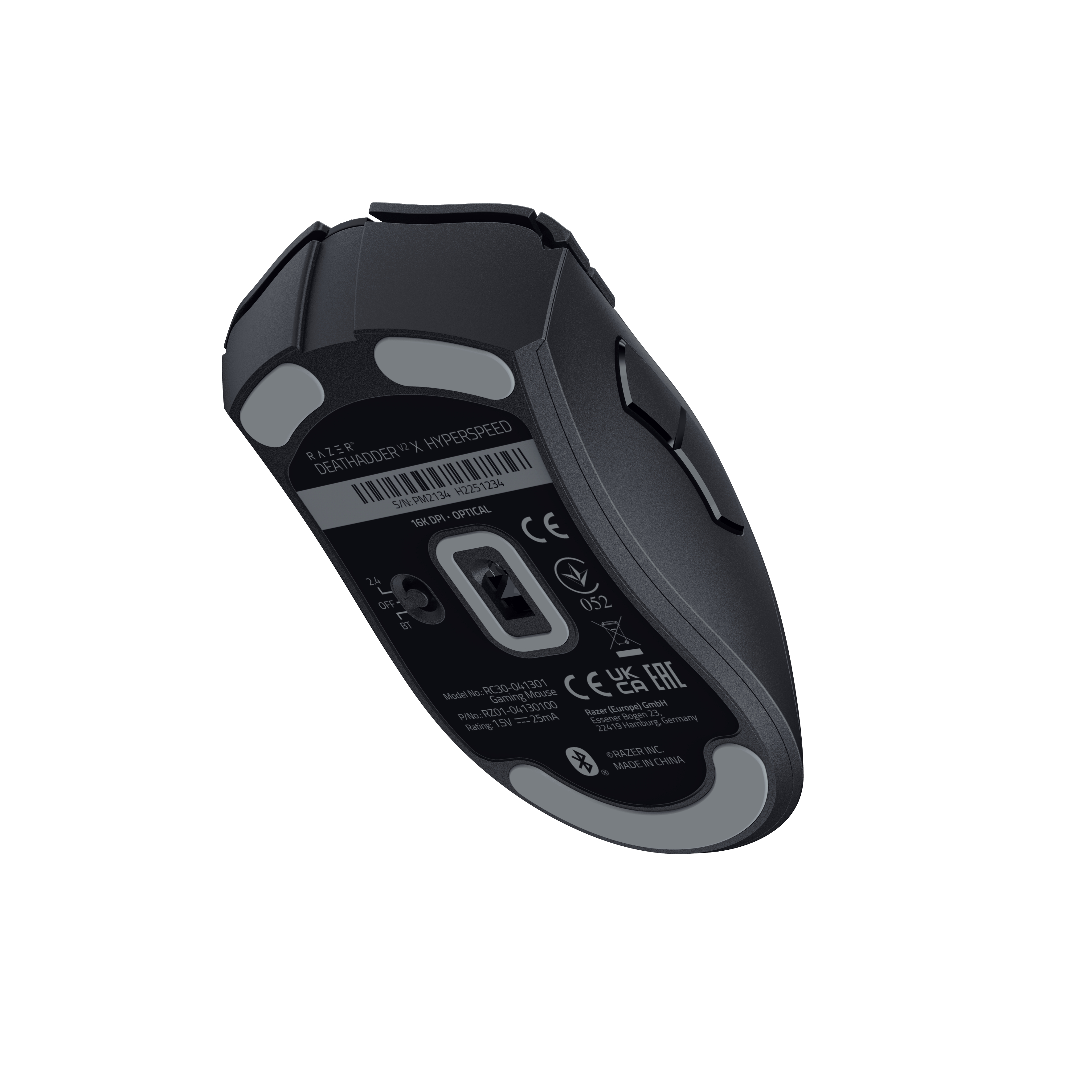 Etiketli siyah bir oyun faresinin alt görünümü.