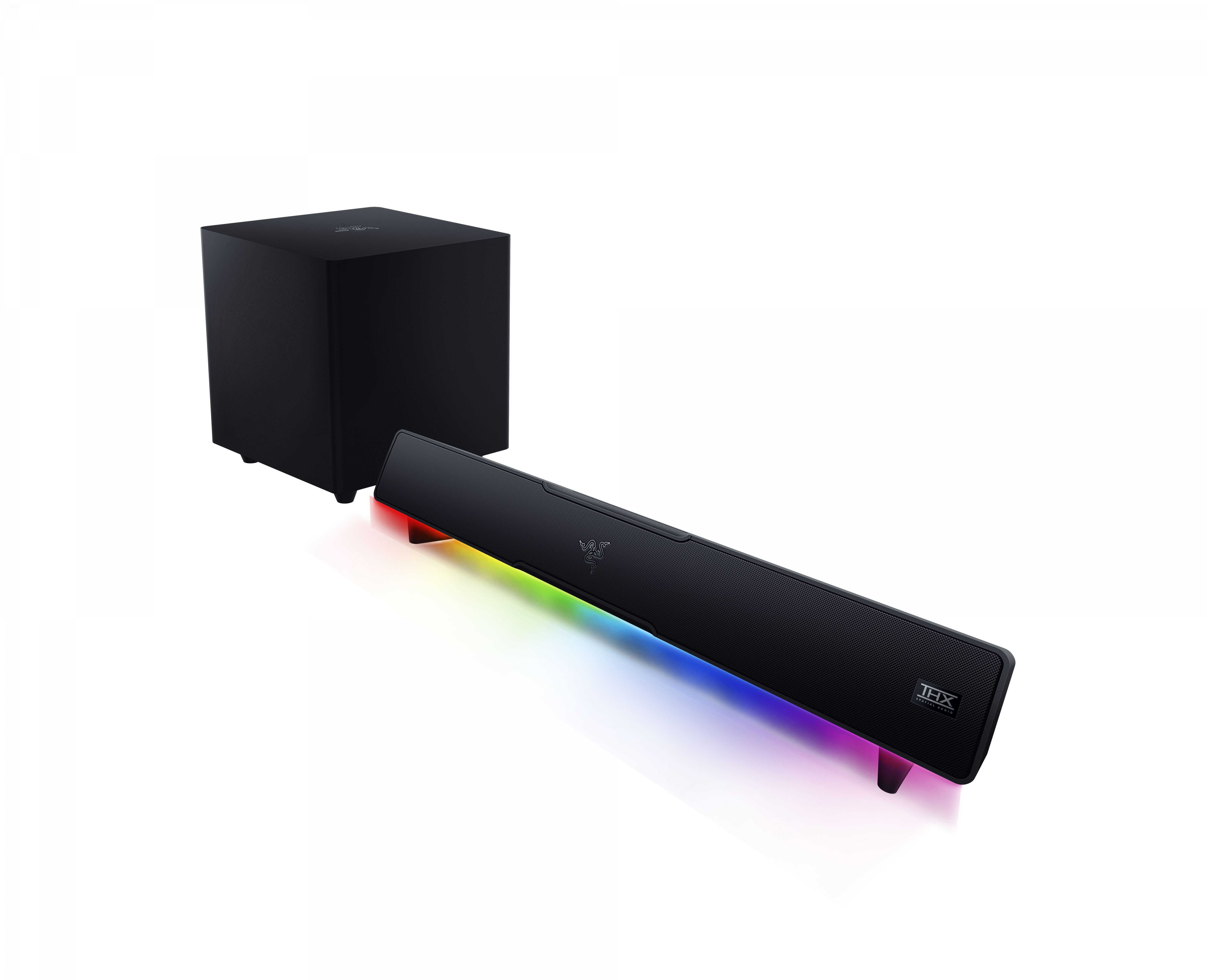 Czarny soundbar z subwooferem, z kolorowymi światłami i białym tłem.