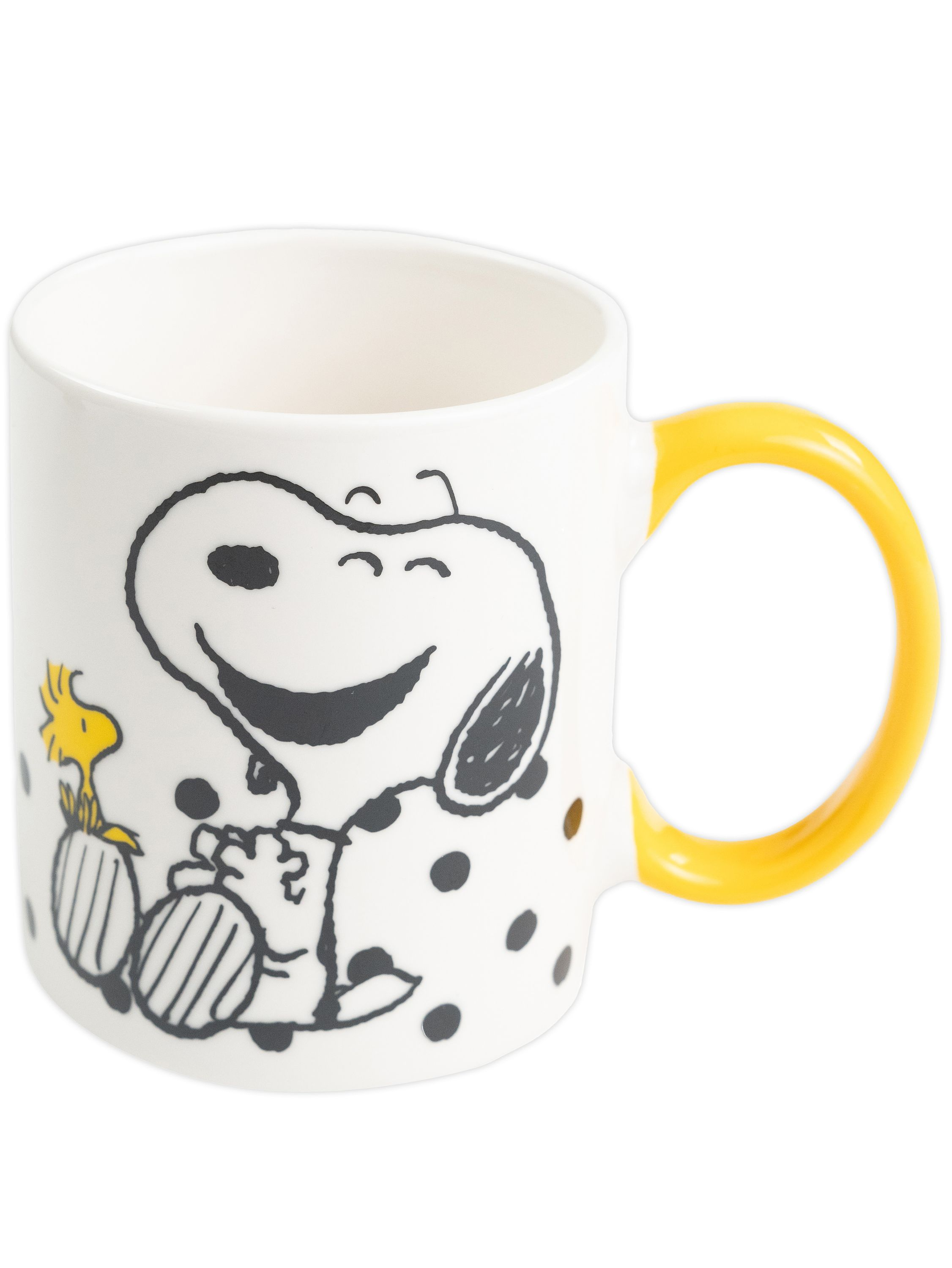 Eine weiße Tasse mit Snoopy und Woodstock. Der Griff ist gelb. Die Tasse hat schwarze Tupfen.