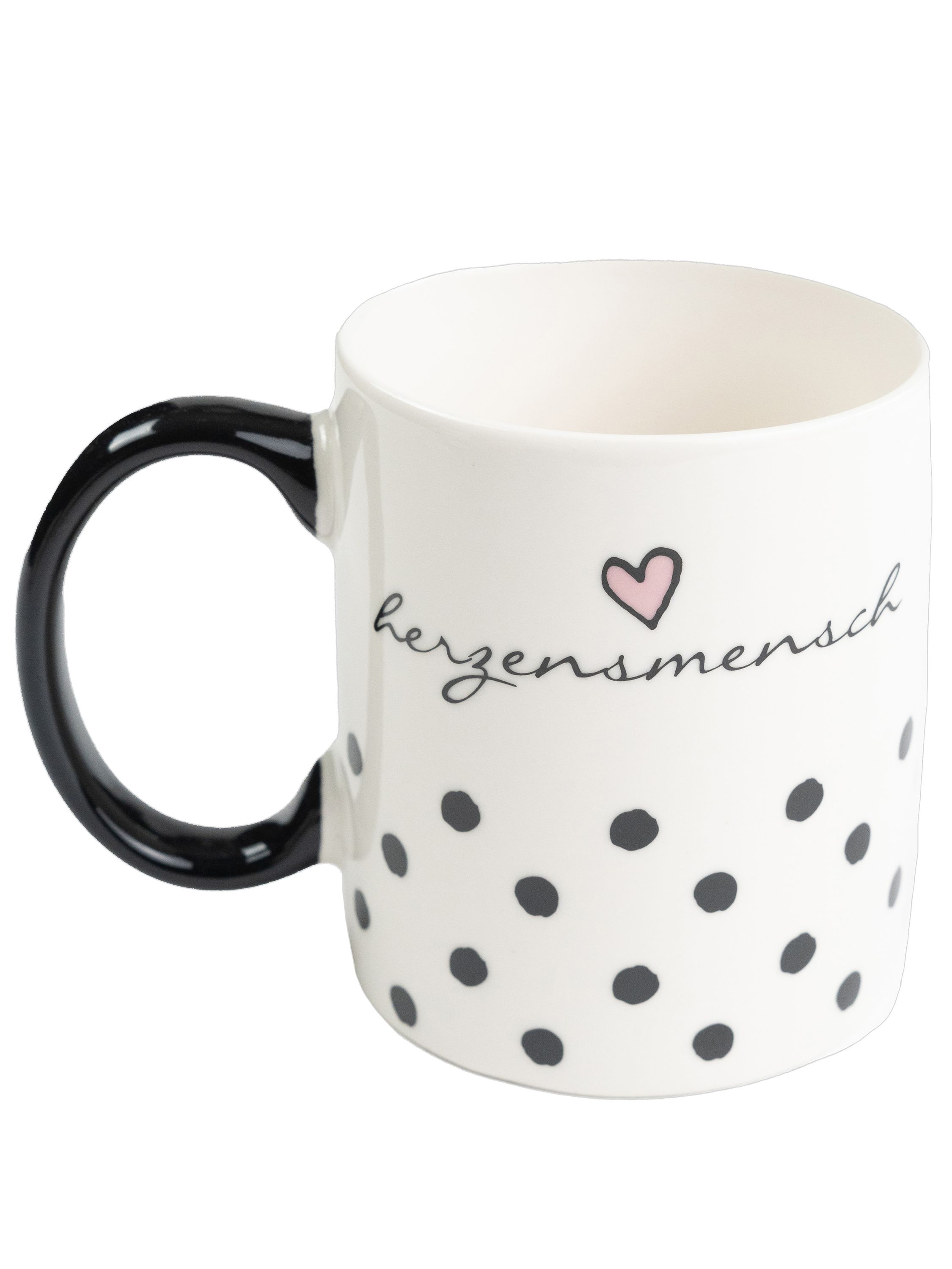 Eine weiße Tasse mit schwarzem Henkel, Tupfen und Schriftzug 'Herzensmensch' mit rosa Herz.