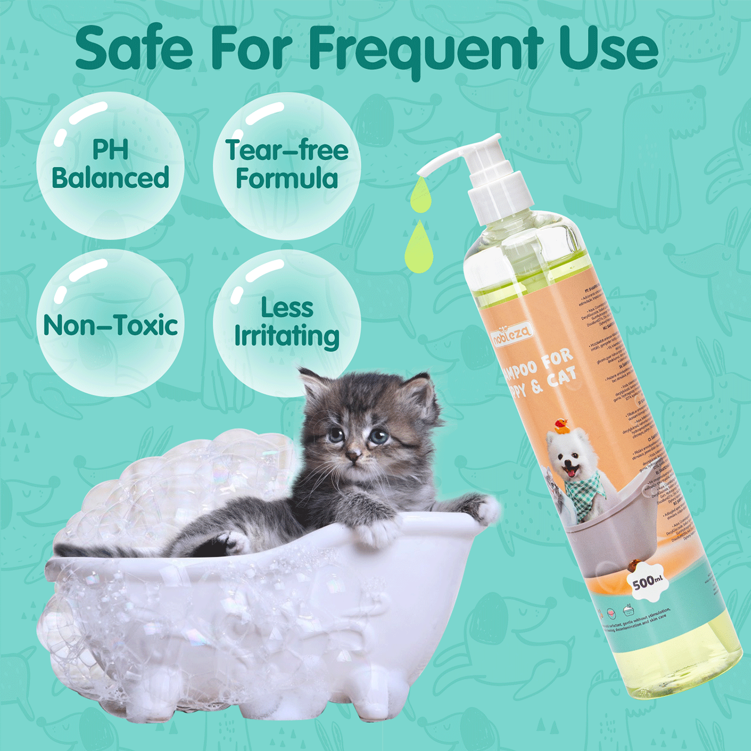 Un gatito en una bañera de burbujas junto a un frasco de champú para gatos.
