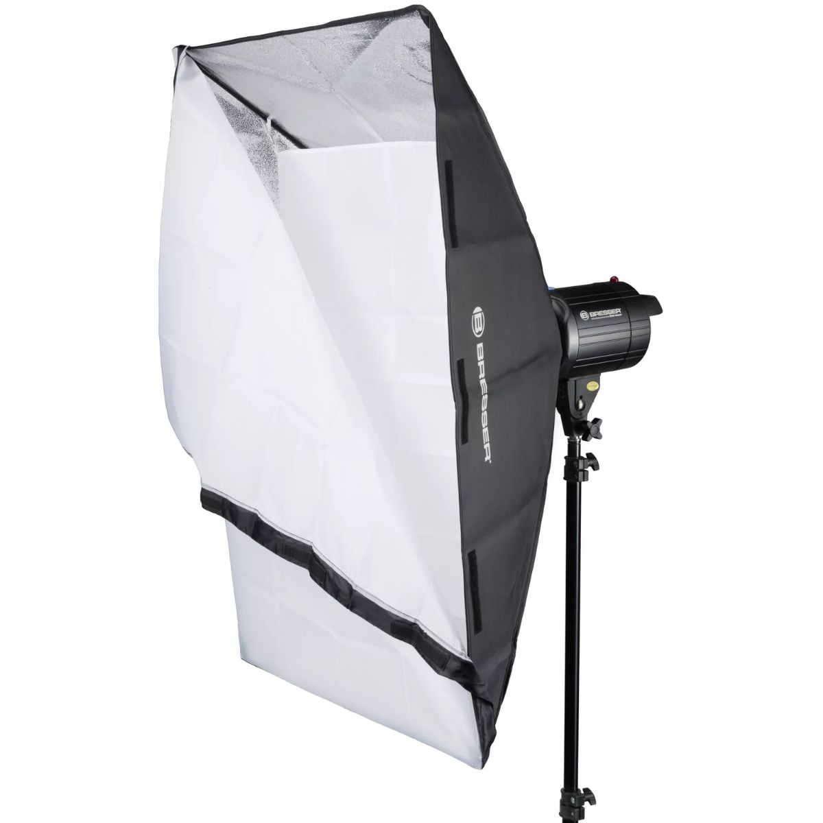 A studio light with a black and white softbox attached, on a stand.