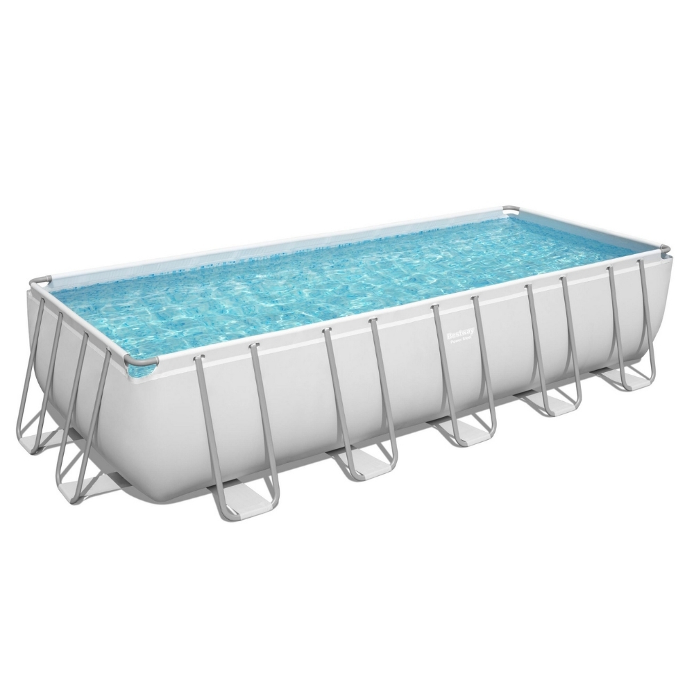 Een rechthoekig zwembad met wit frame en blauw water.
