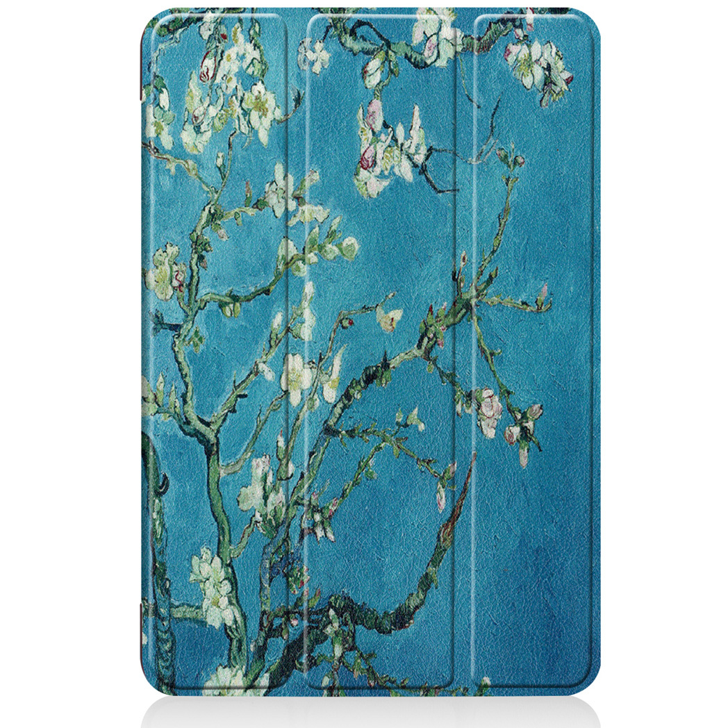 Tablet case with a painting of blooming white flowers on a blue background.