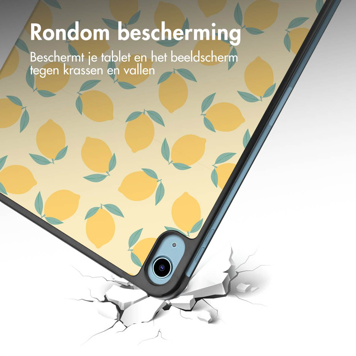 Un étui de tablette avec un motif de citrons. L'étui est sur une surface fissurée.