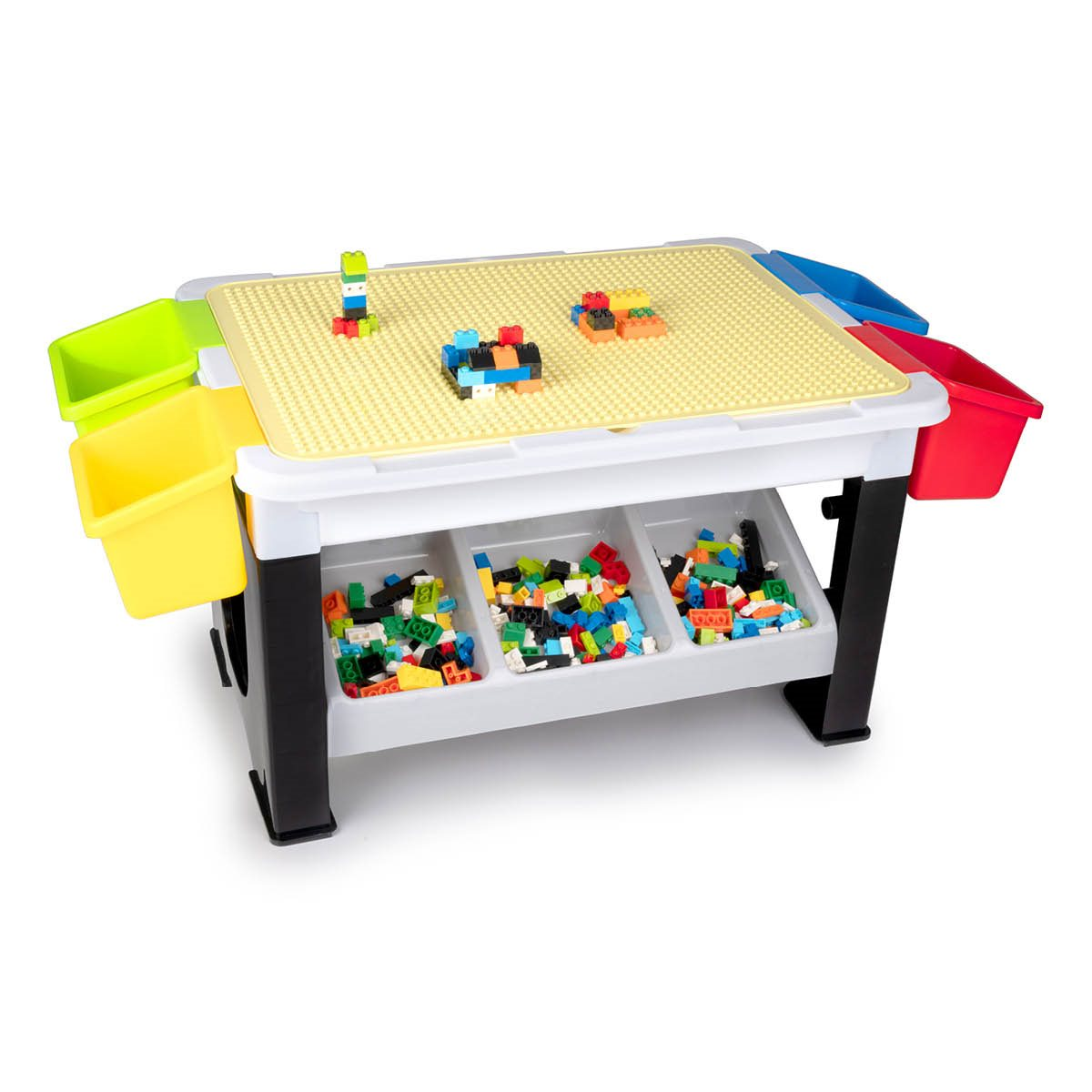 A colorful children's building block table with bins.