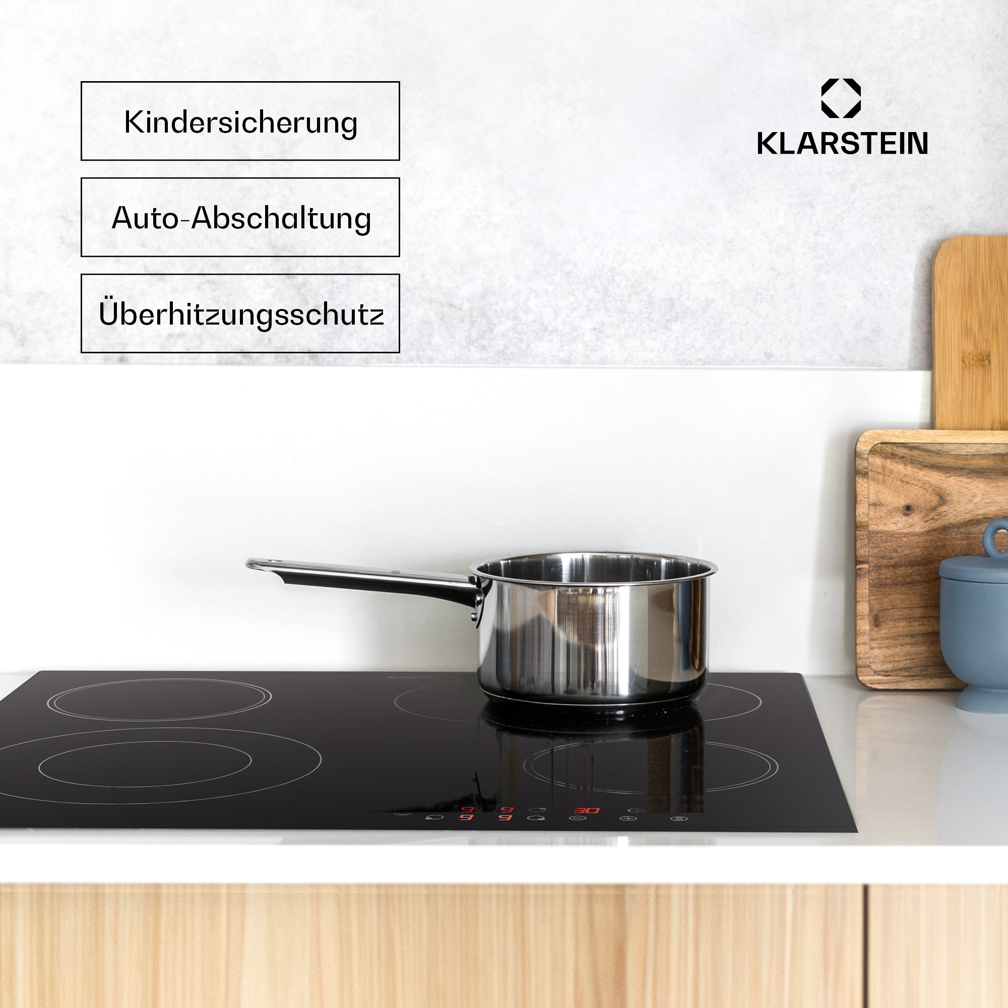 Schwarzes Kochfeld mit Topf. Touch-Steuerung, Holzsockel.