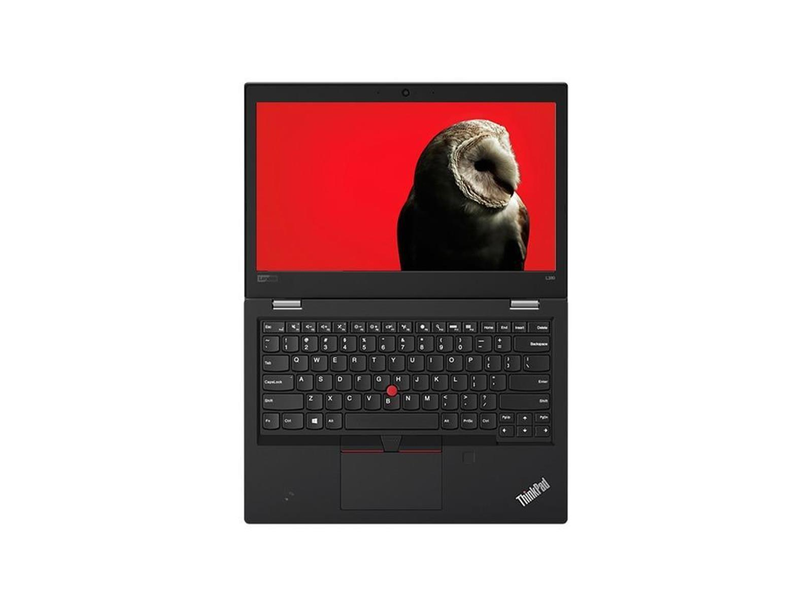 Schwarzer Laptop mit einer Eule auf dem Bildschirm. Die Tastatur ist schwarz mit rotem Trackpoint.