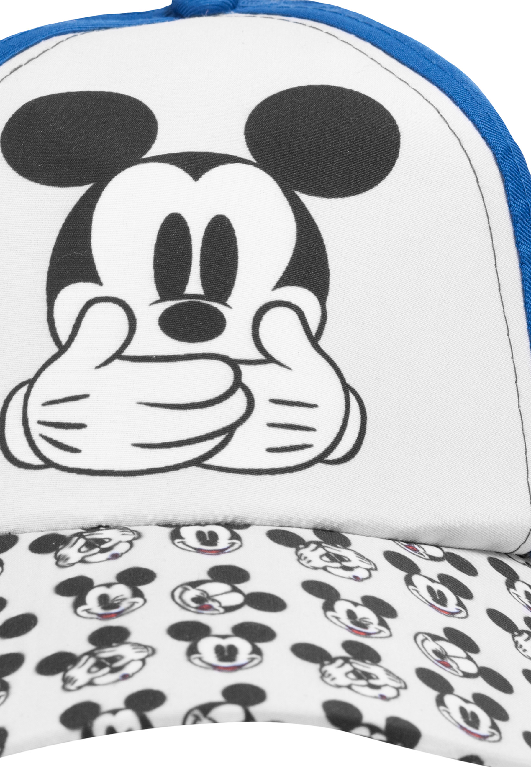 Nahaufnahme einer Mickey-Mouse-Kappe. Obere Hälfte zeigt Mickey. Untere Hälfte hat Mickey-Muster.