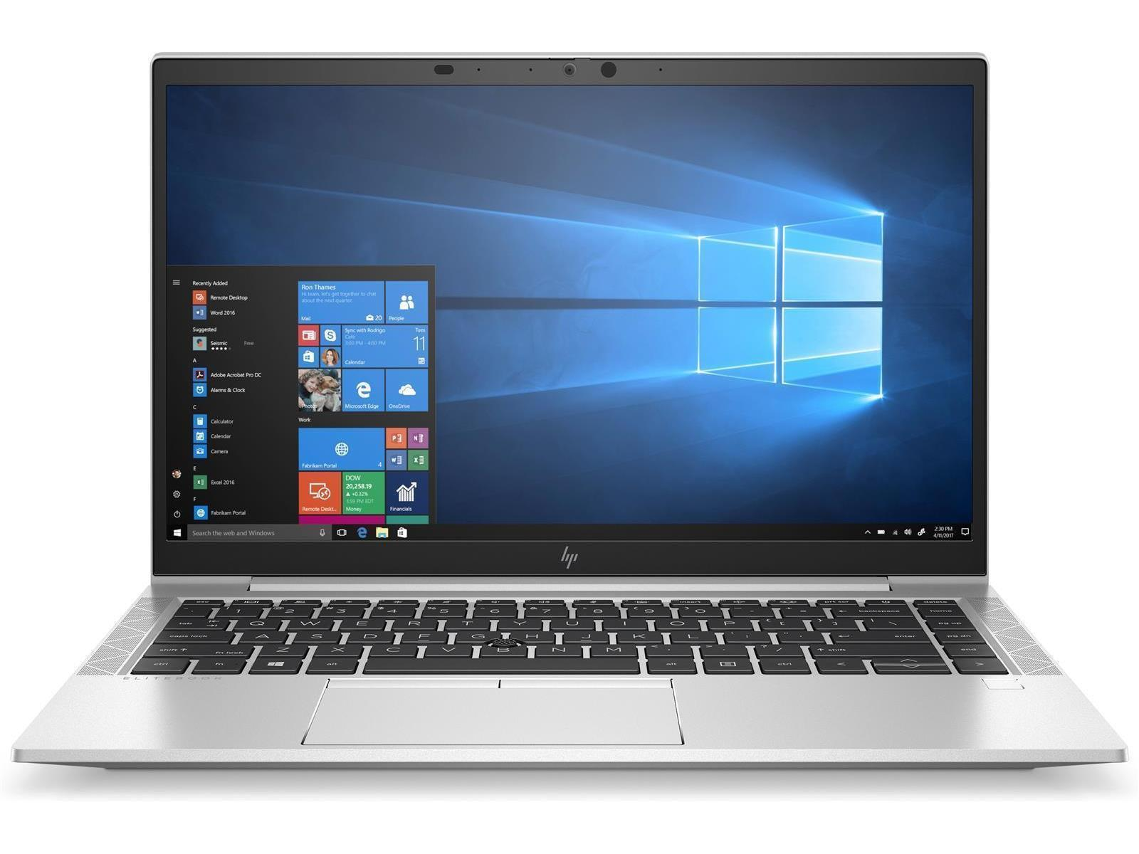 Ein silberfarbener Laptop mit sichtbarem Windows-Desktop. Der Bildschirm zeigt das Startmenü. Der Laptop ist geöffnet.