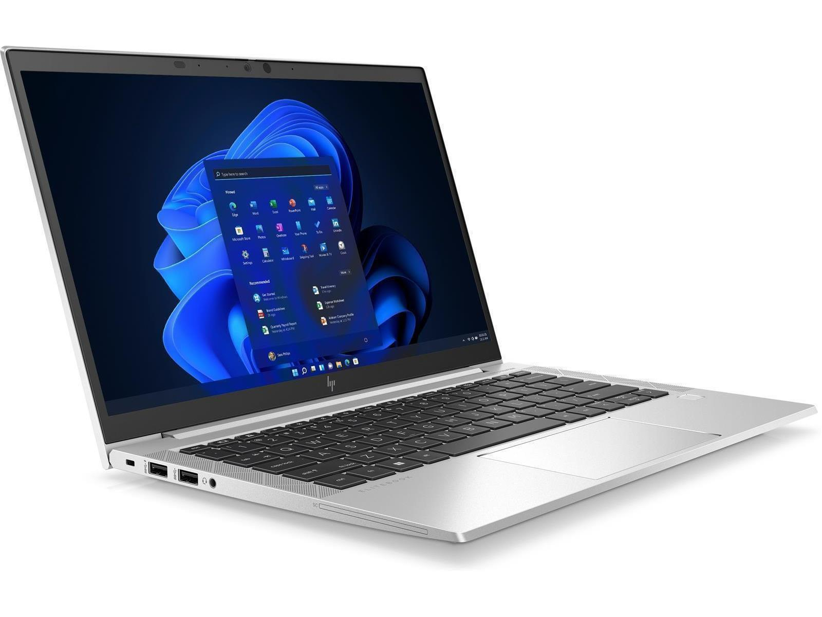 Silberner Laptop offen, zeigt den Windows-Desktop. HP-Logo sichtbar. Der Bildschirm zeigt blauen Hintergrund.