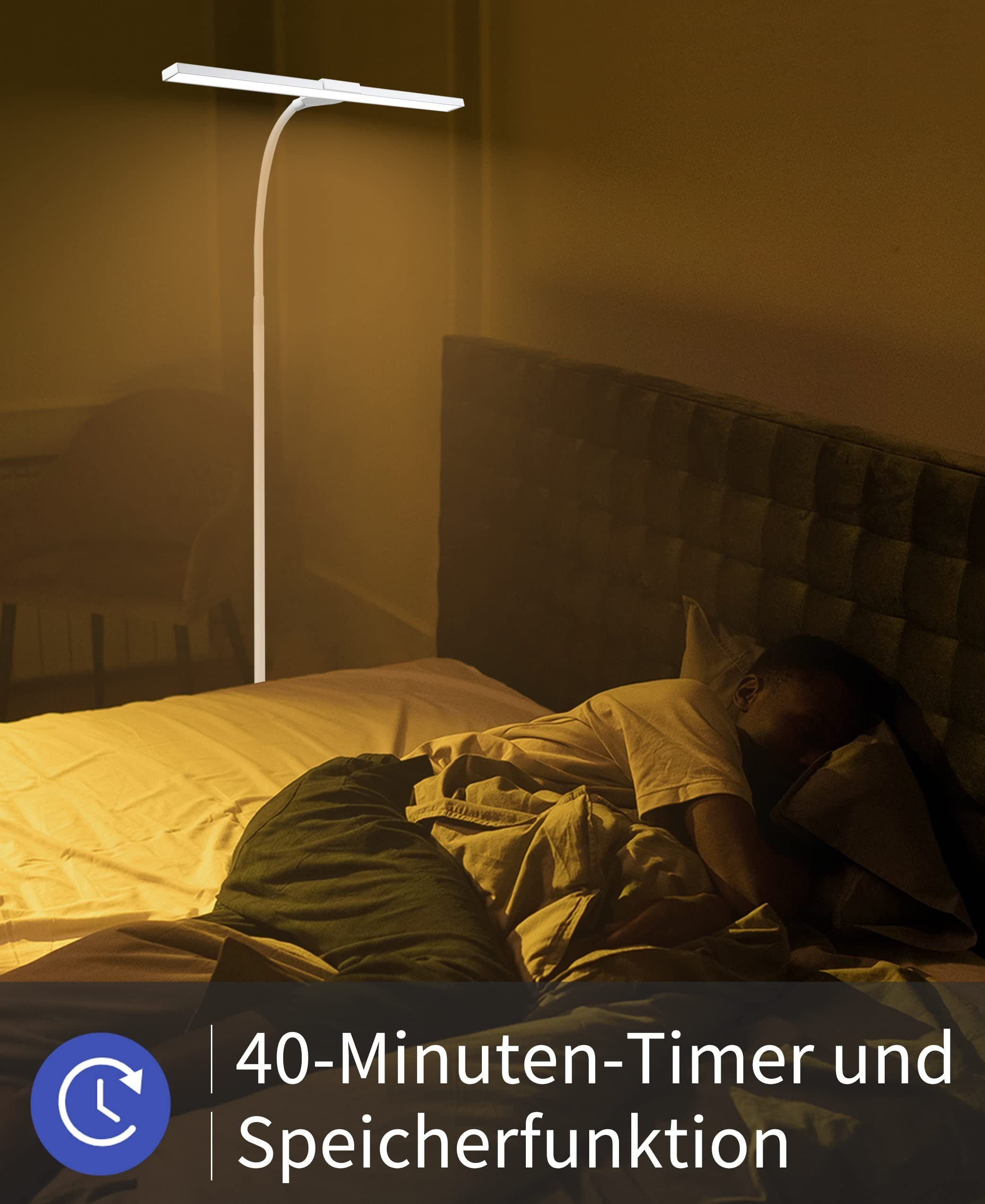 Una persona che dorme a letto con una lampada accesa. La lampada è bianca e curva, proiettando una luce calda.