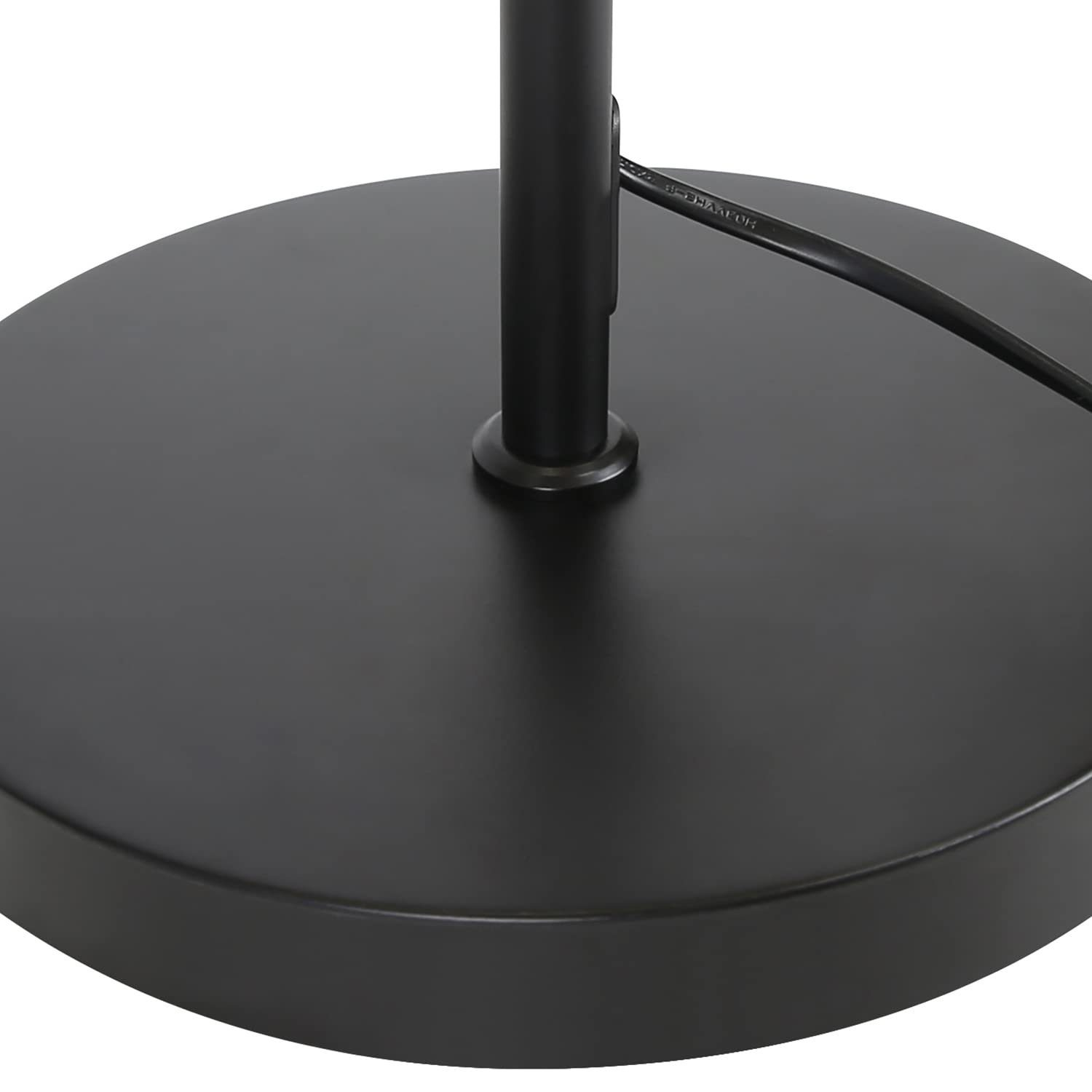 Base lampada rotonda nera con cavo di alimentazione e superficie liscia.