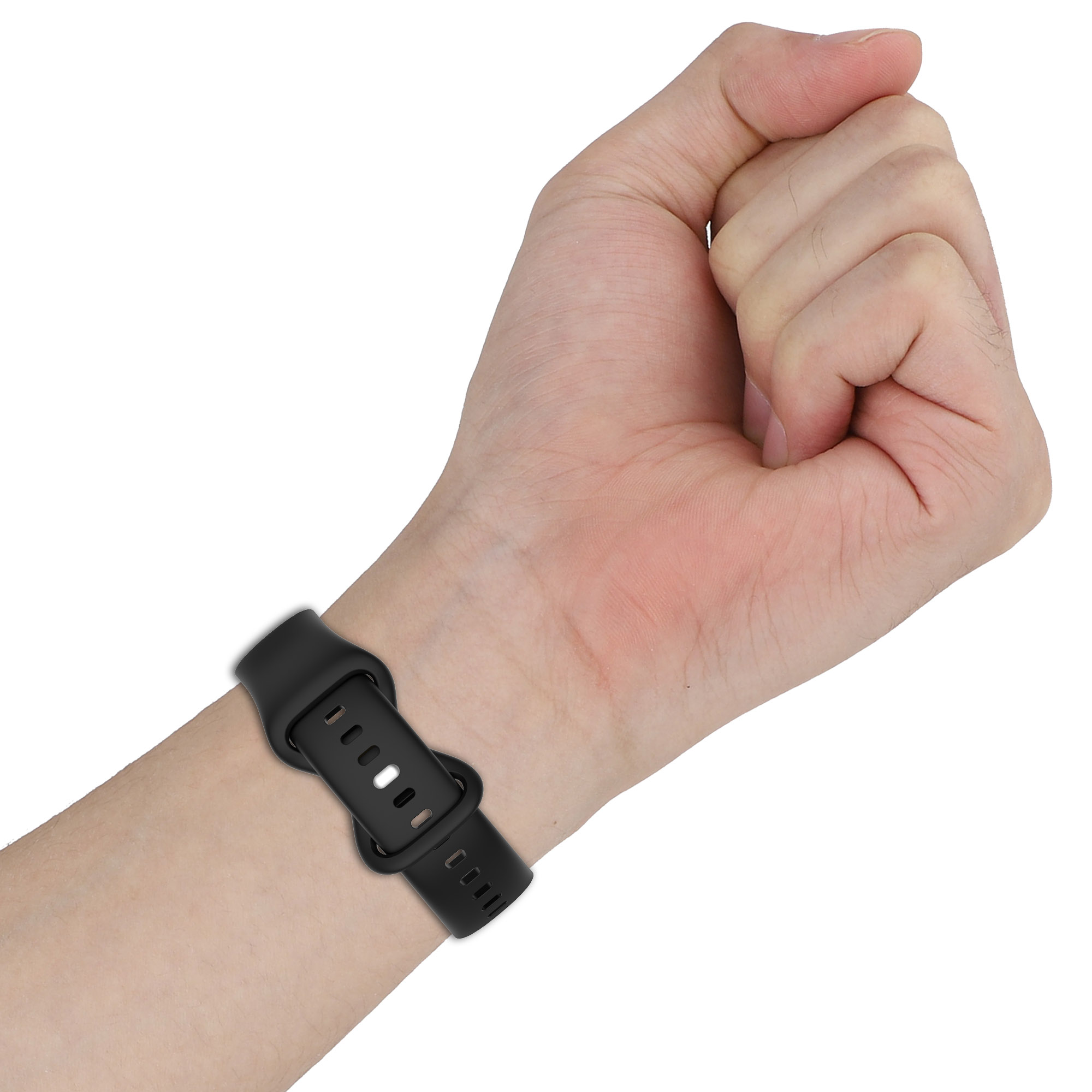 Schwarzes Uhrenarmband an einer hellhäutigen Hand. Das Band ist geschnallt.