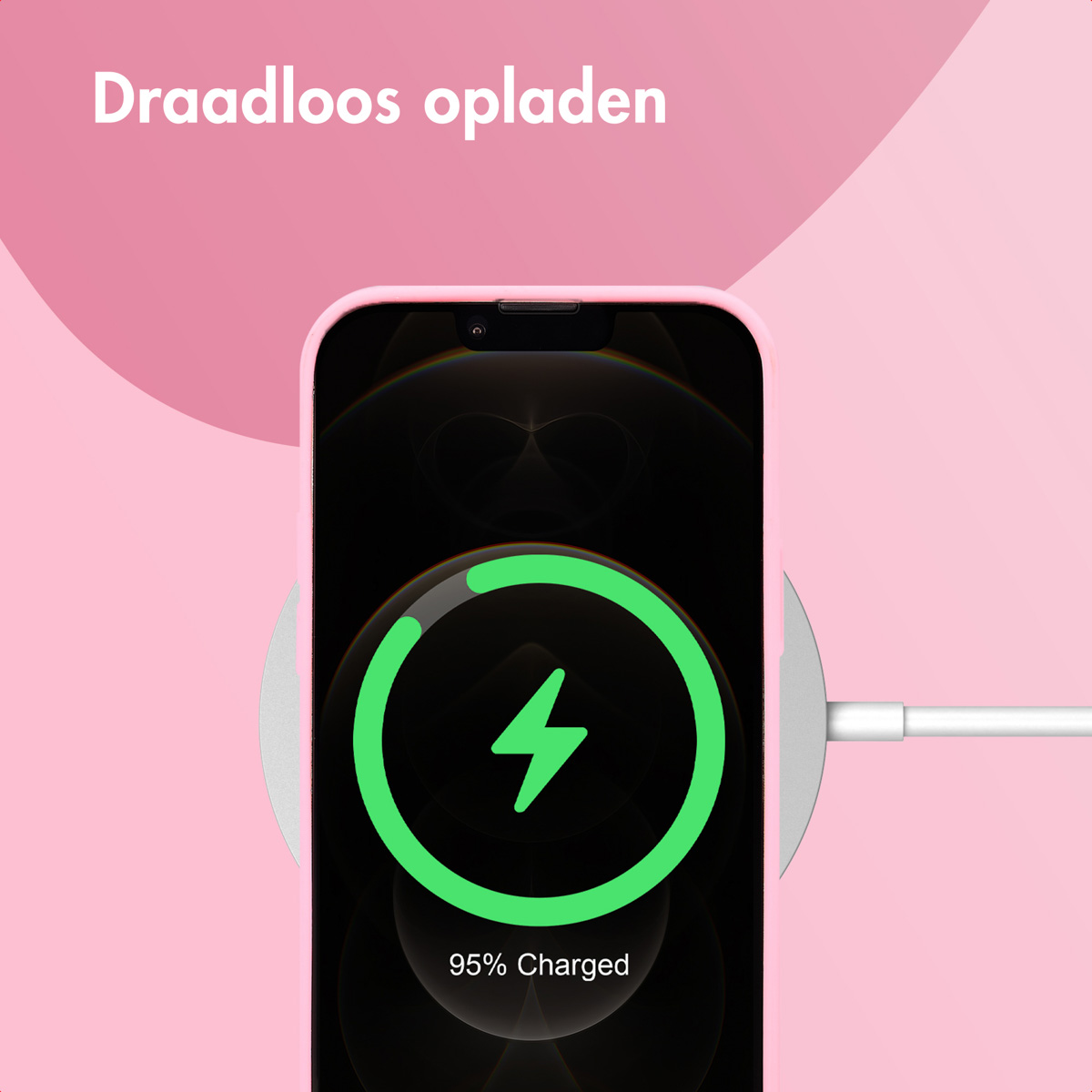Téléphone en charge sans fil. Icône d'éclair vert à l'écran. Fond rose avec texte.