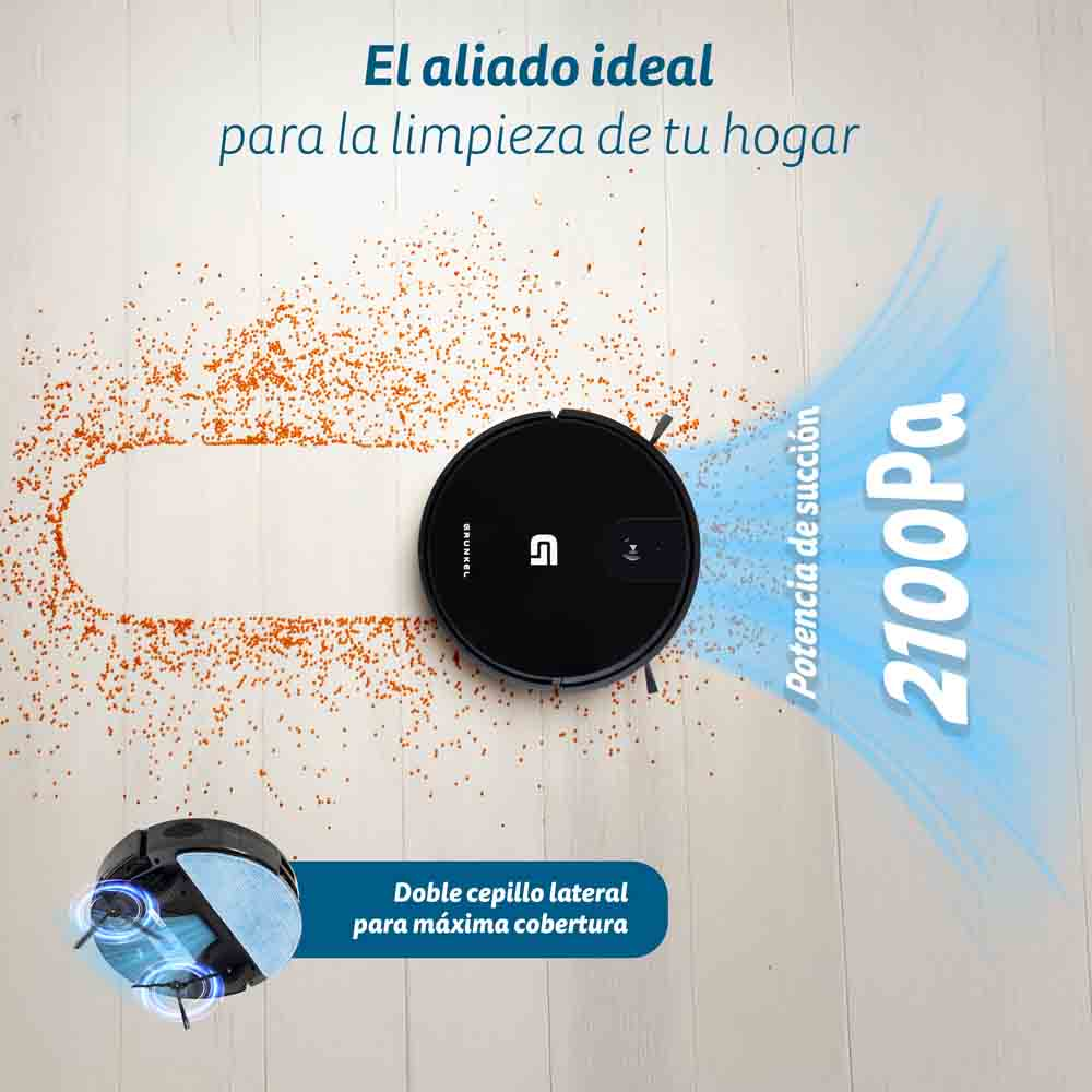 Una aspiradora robot negra limpiando un piso. Tiene un cepillo en la parte inferior y un rastro de succión azul.